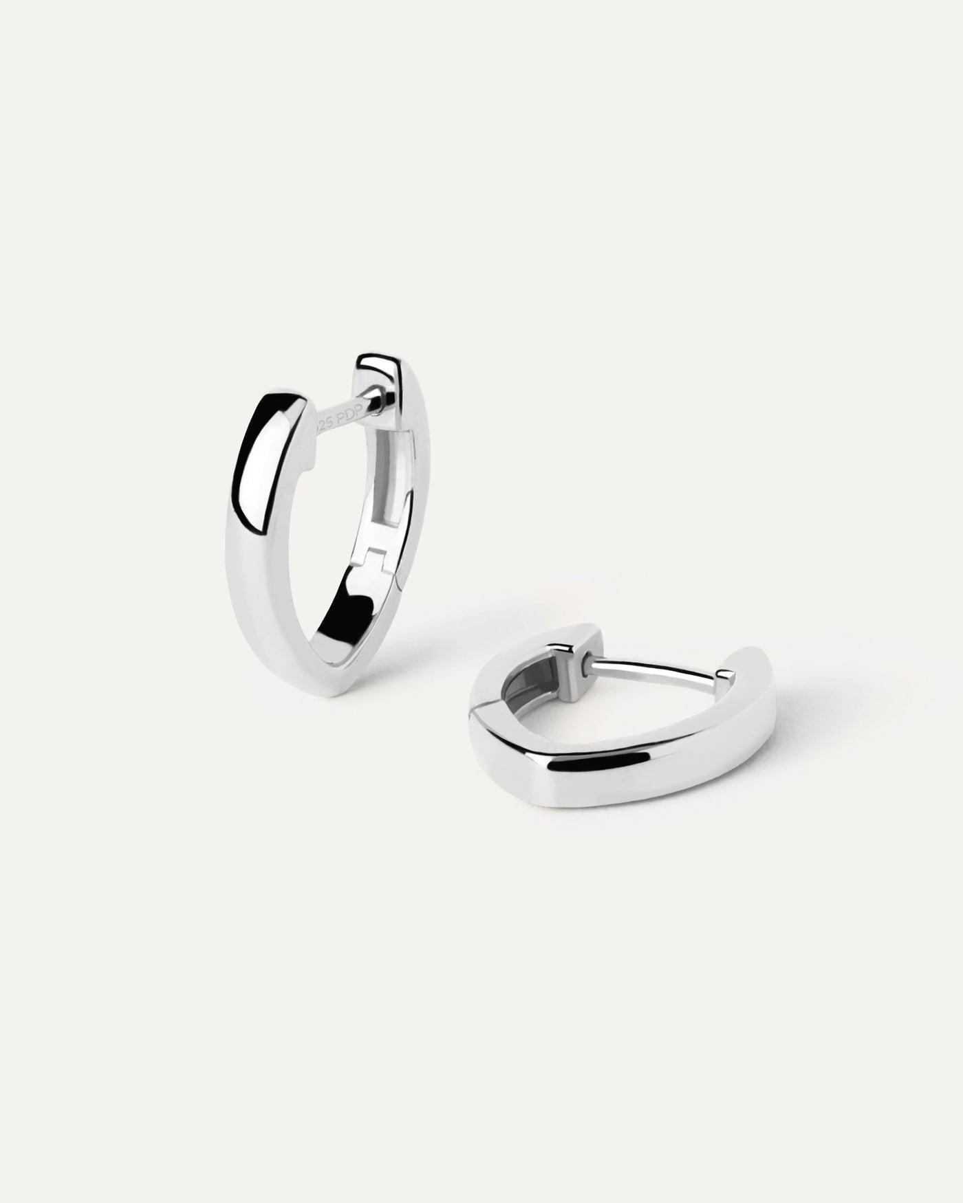 2023 Selection | Duke Silver Hoops. Sterling silver oval shape huggies with a hinged opening. Get the latest arrival from PDPAOLA. Place your order safely and get this Best Seller. Free Shipping.