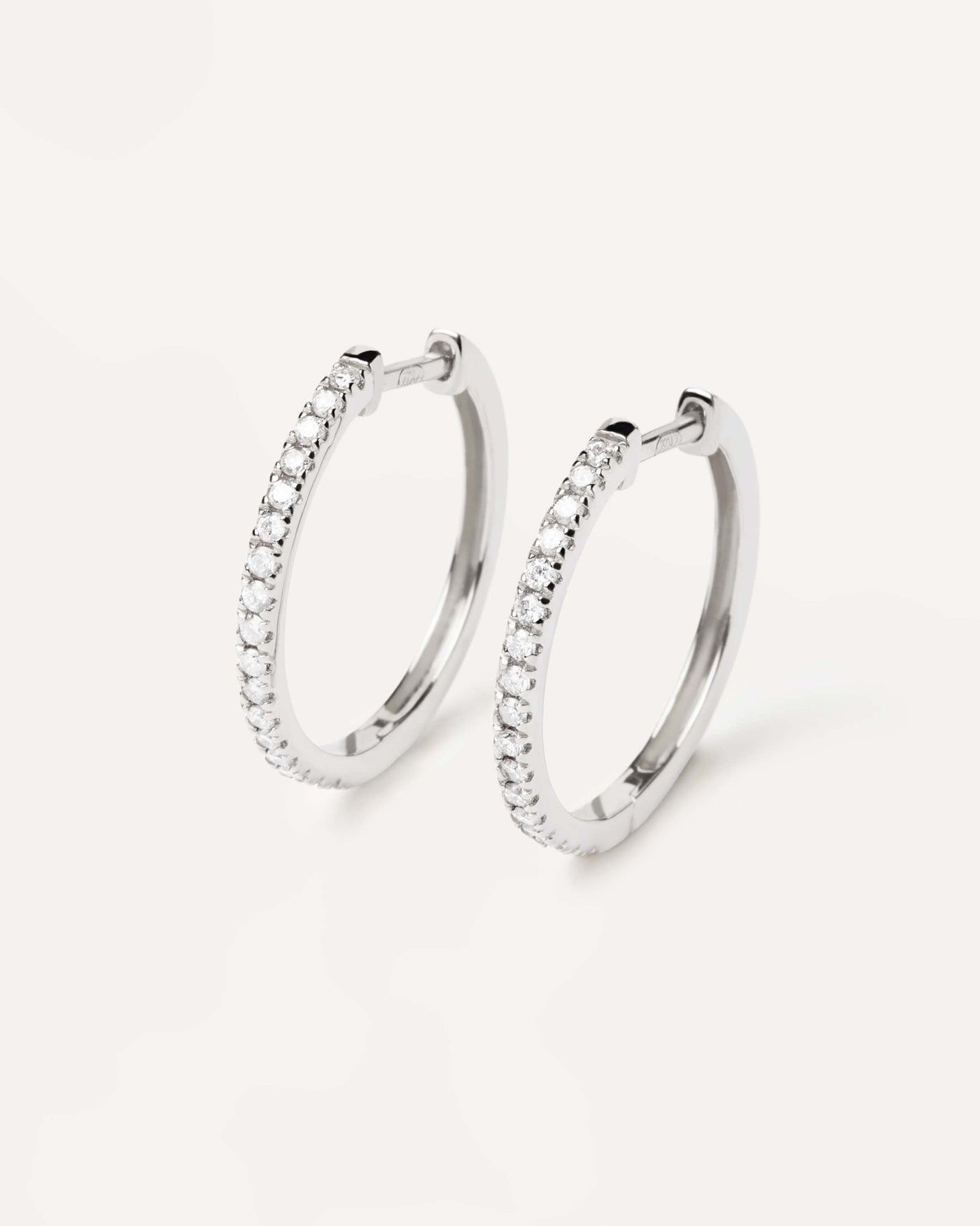 2024 Selection | Diamonds and White Gold Eternity Medium Hoops. Solid white gold hoop earrings, set with lab-grown diamonds of 0.39 carats in total. Get the latest arrival from PDPAOLA. Place your order safely and get this Best Seller. Free Shipping.