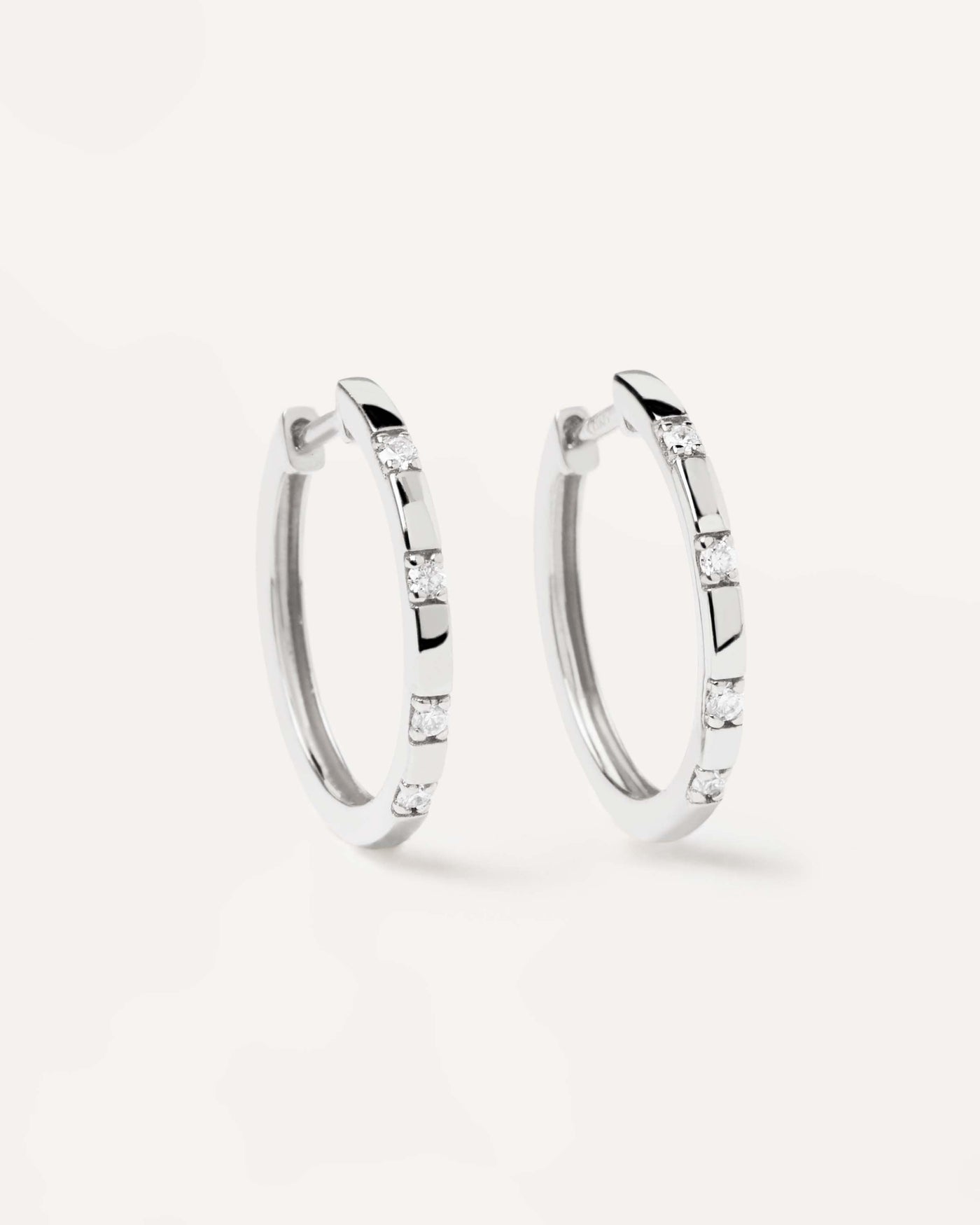 2024 Selection | Diamonds and White Gold Frosty Hoops. Solid white gold hoop earrings set with lab-grown diamonds of 0.12 carats in total. Get the latest arrival from PDPAOLA. Place your order safely and get this Best Seller. Free Shipping.