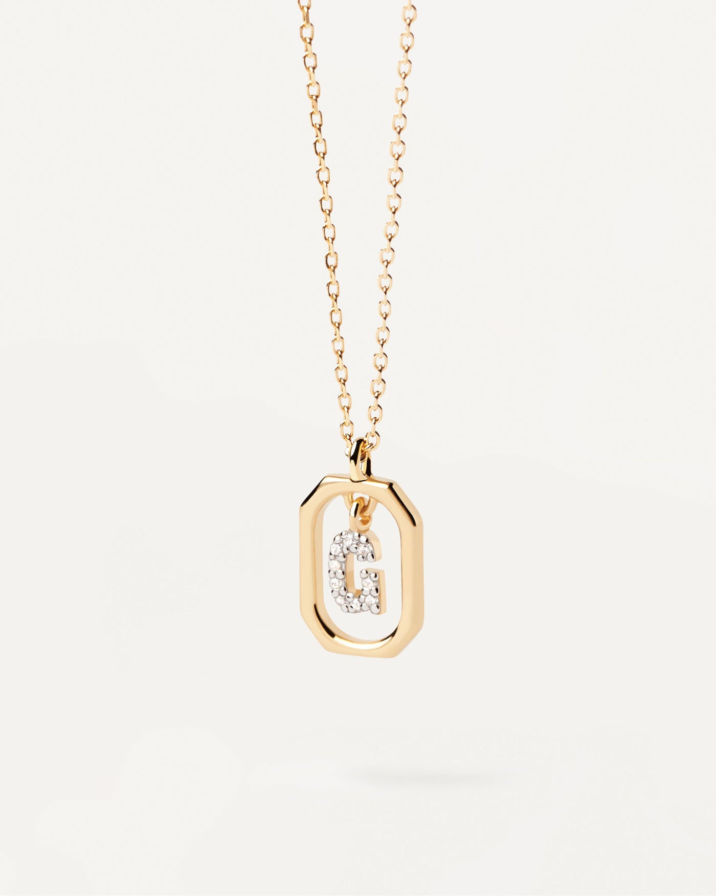 2023 Selection | Mini Letter G Necklace. Small initial G necklace in zirconia inside gold-plated silver octagonal pendant. Get the latest arrival from PDPAOLA. Place your order safely and get this Best Seller. Free Shipping.