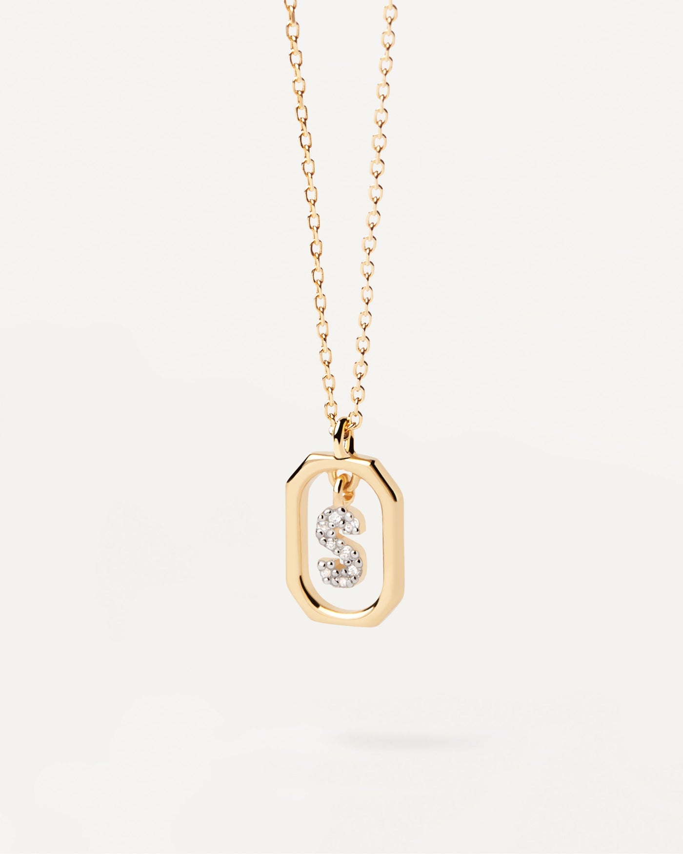 2023 Selection | Mini Letter S Necklace. Small initial S necklace in zirconia inside gold-plated silver octagonal pendant. Get the latest arrival from PDPAOLA. Place your order safely and get this Best Seller. Free Shipping.