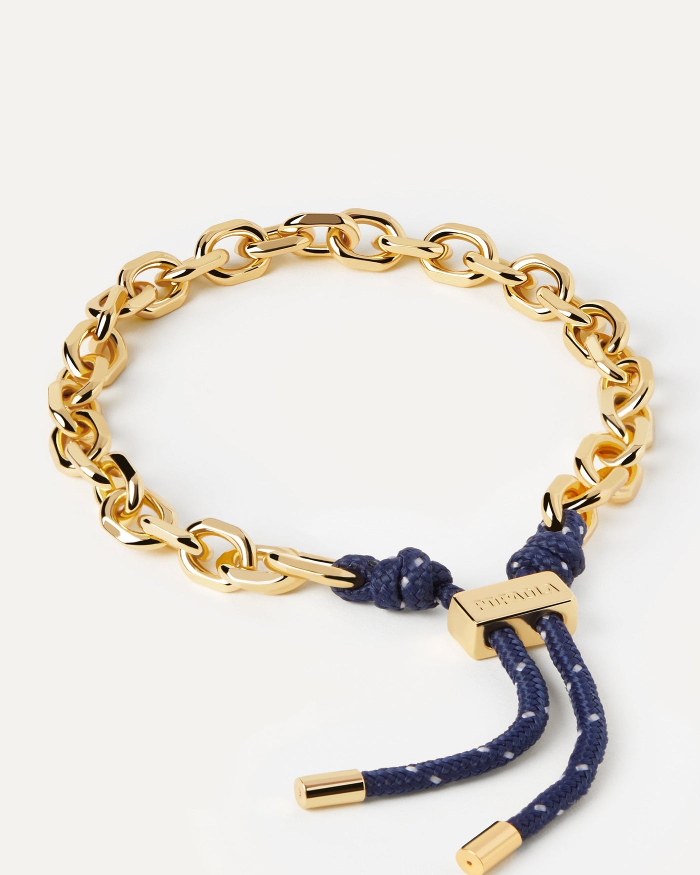 2023 Selection | Midnight Essential Rope and Chain Bracelet. Silver chain bracelet with interwined navy blue rope and adjustable sliding clasp. Get the latest arrival from PDPAOLA. Place your order safely and get this Best Seller. Free Shipping.