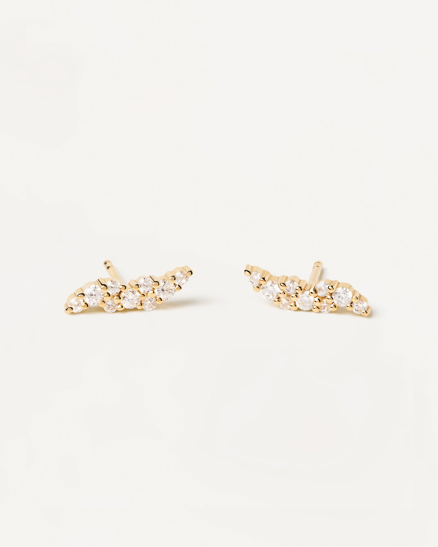 2023 Selection | Natura Earrings. Basic gold-plated silver earrings with small white crystals. Get the latest arrival from PDPAOLA. Place your order safely and get this Best Seller. Free Shipping.