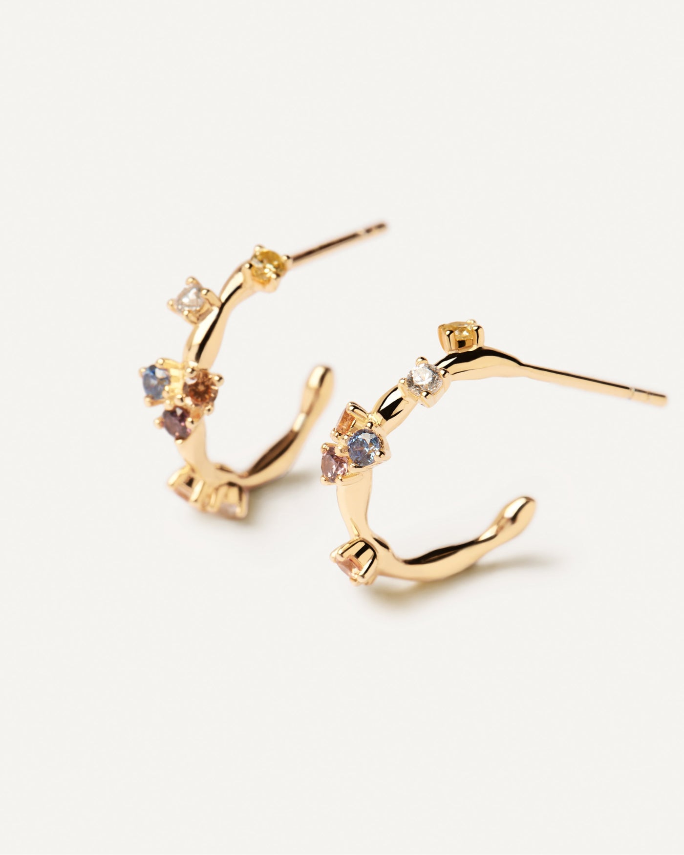 2023 Selection | Five Earrings. Dainty hoops in gold-plated silver with five color zirconias. Get the latest arrival from PDPAOLA. Place your order safely and get this Best Seller. Free Shipping.