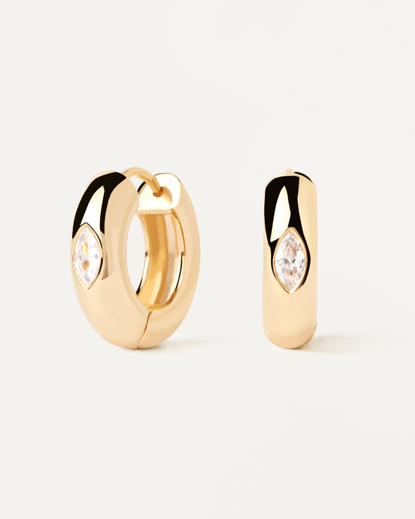2023 Selection | Ura Hoop Earrings. Bold hoop earrings in gold-plated silver with oval white zirconia. Get the latest arrival from PDPAOLA. Place your order safely and get this Best Seller. Free Shipping.
