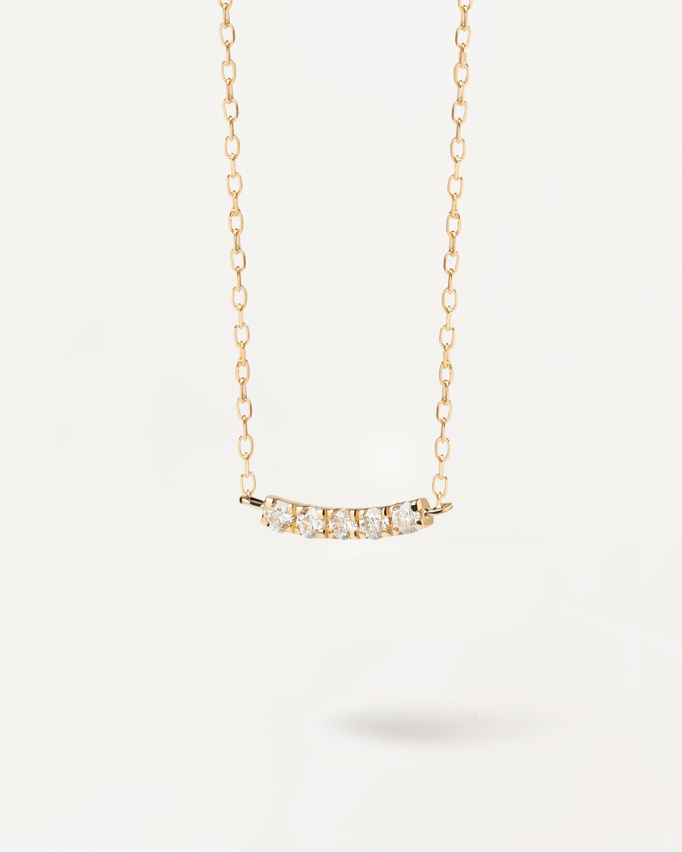 2024 Selection | Diamonds and Gold Eternity Necklace. Solid yellow gold necklace with five lab-grown diamonds of fine round cut, making 0.07 carats. Get the latest arrival from PDPAOLA. Place your order safely and get this Best Seller. Free Shipping.