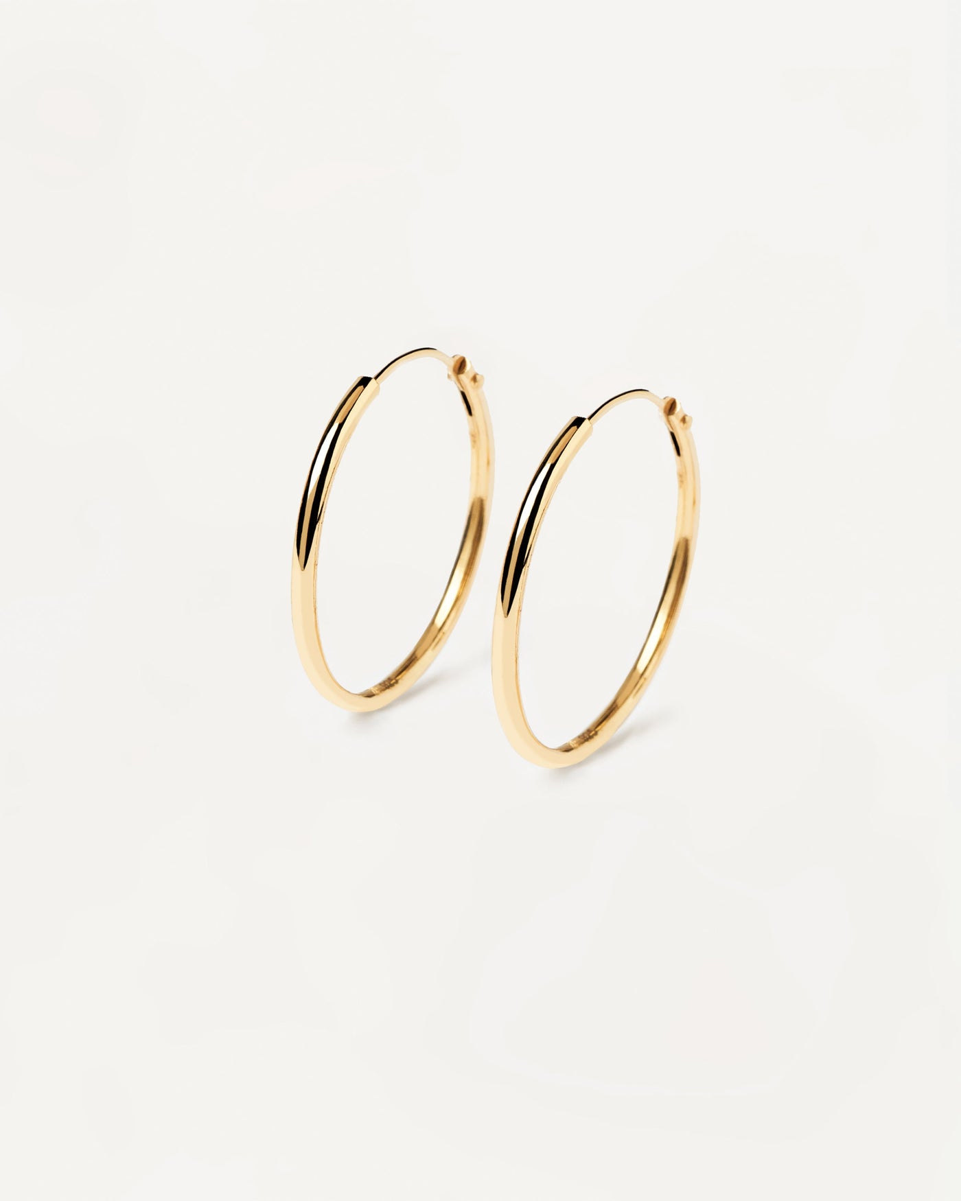 2023 Selection | Medium Hoops. Classic round endless hoop earrings in 18k gold plated silver. Get the latest arrival from PDPAOLA. Place your order safely and get this Best Seller. Free Shipping.