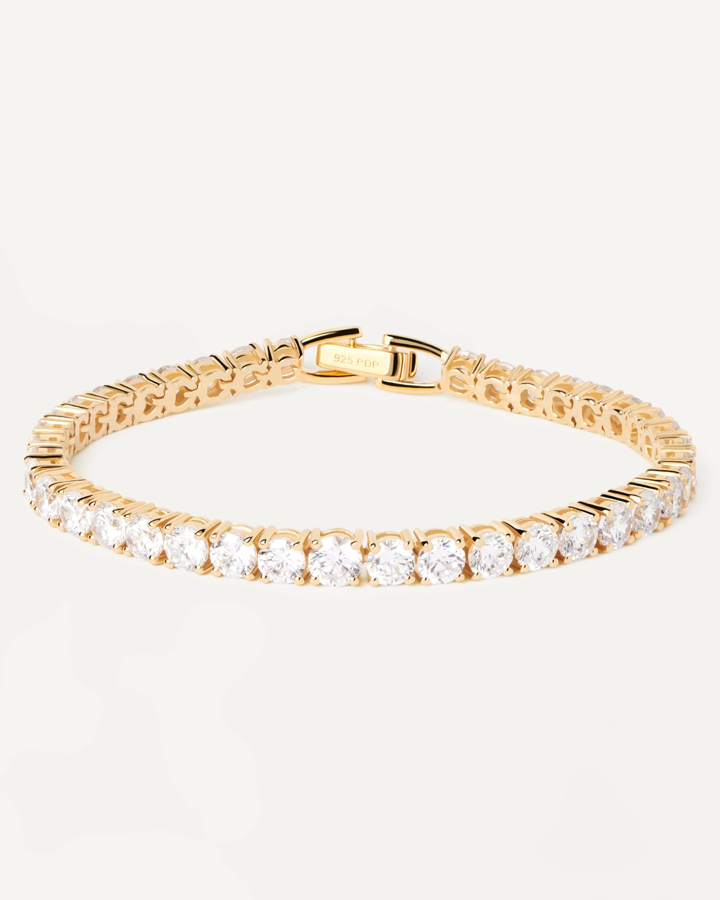 2023 Selection | Tennis Supreme Bracelet. Gold-plated silver chain bracelet with tennis link and white zirconia. Get the latest arrival from PDPAOLA. Place your order safely and get this Best Seller. Free Shipping.