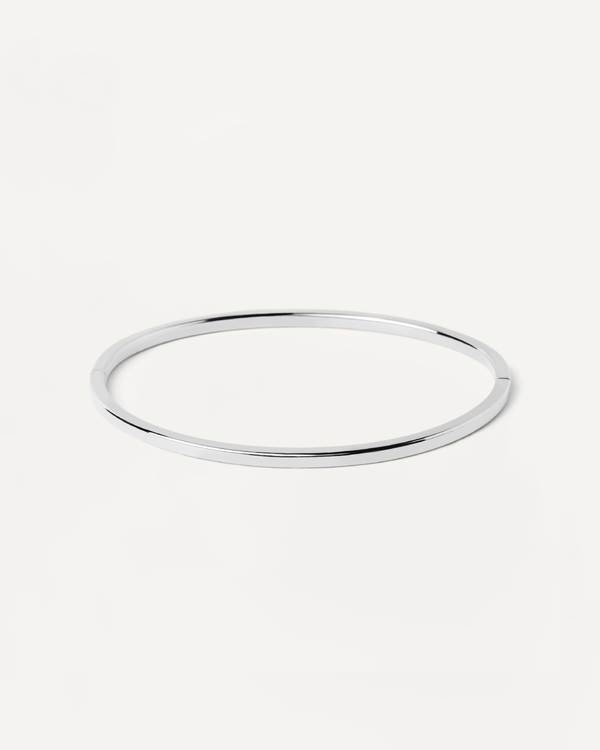 2023 Selection | White Gold Core Bangle. 18K solid white gold hinged rigid bracelet with basic plain design. Get the latest arrival from PDPAOLA. Place your order safely and get this Best Seller. Free Shipping.