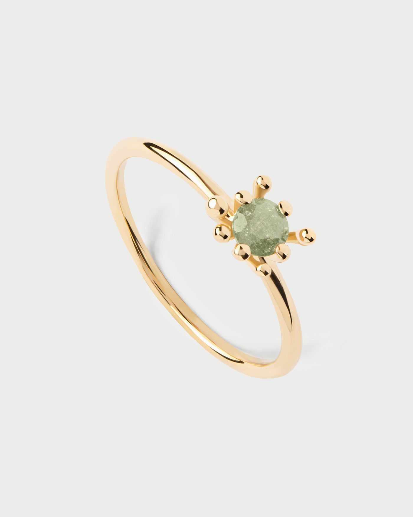 Anello organico ornato da zirconi verde ghiaccio circondati da molteplici griffe