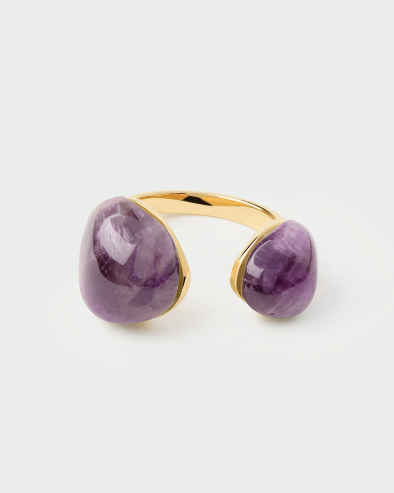Anillo abierto escultural adornado con dos piedras moradas fluidas