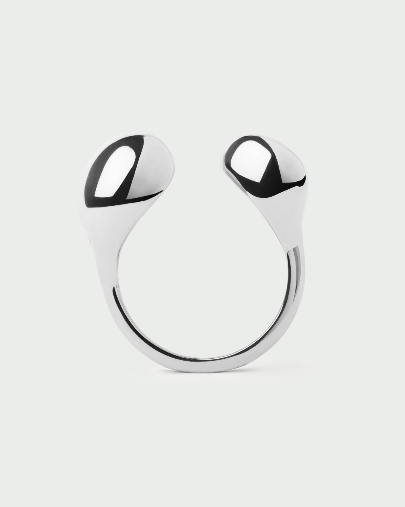 Anneau ouvert sculptural en argent avec deux gouttes fluides