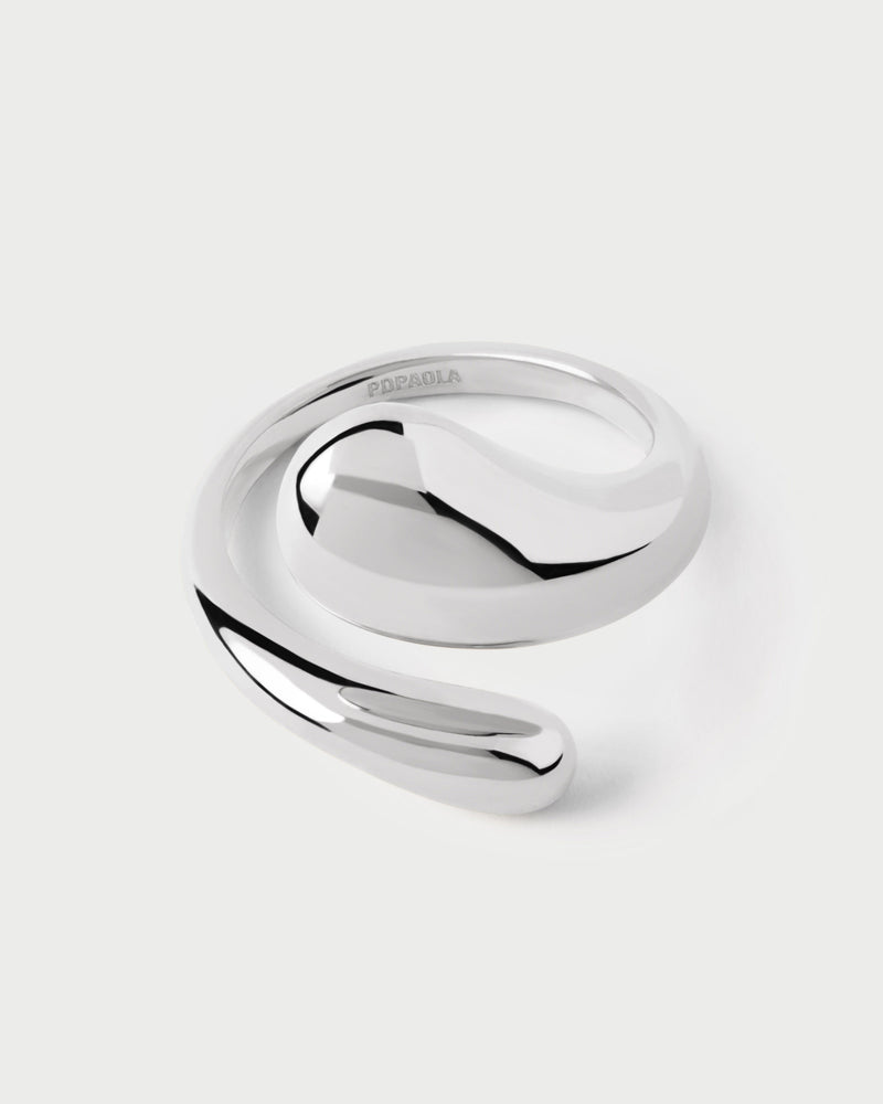 Silver sculptural bypass ring with an eloganted drop shape