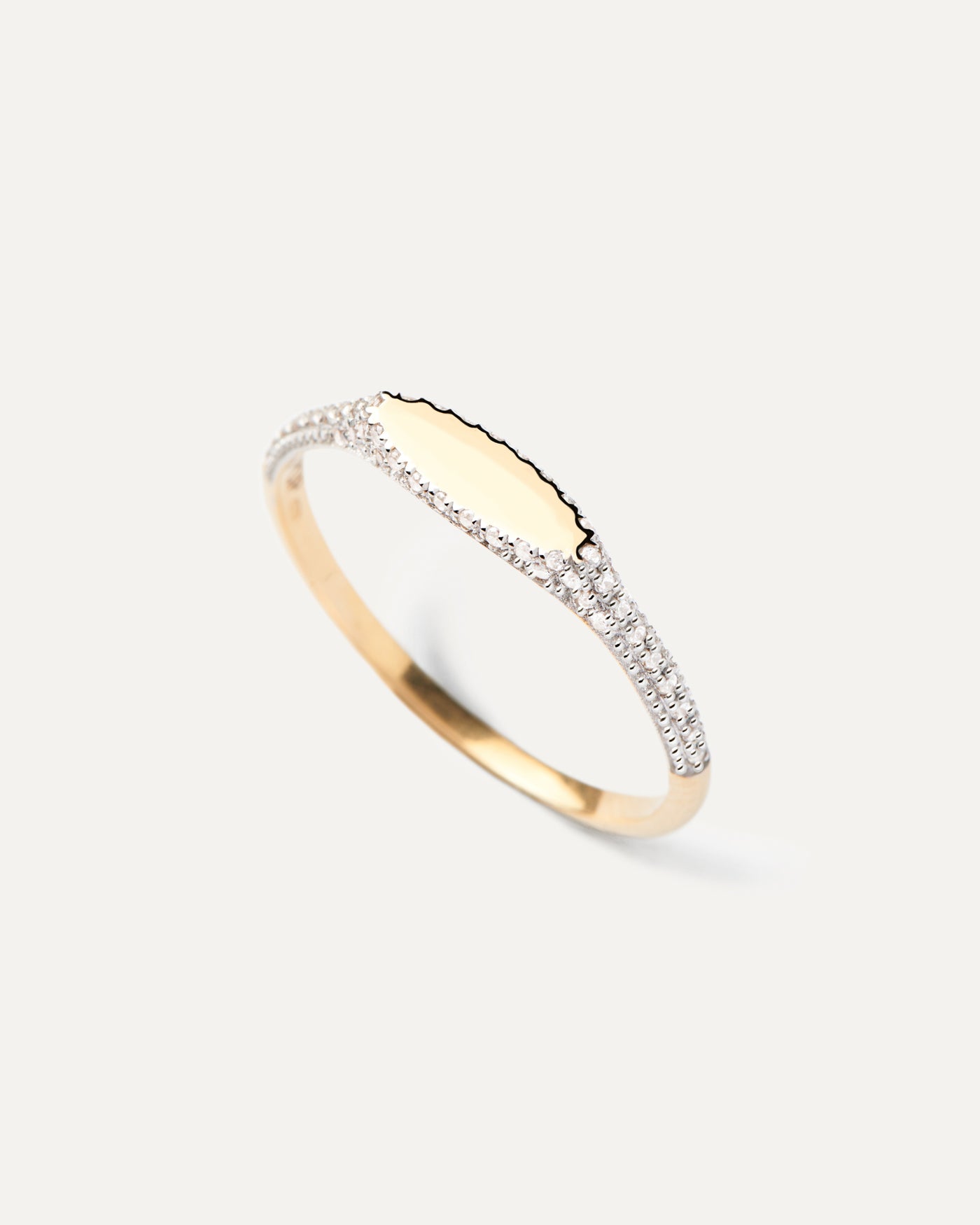 2023 Selection | Diamonds and Gold Tess Stamp Ring. Slim signet ring in solid 18K yellow gold set with pavé diamonds of 0.15 carats . Get the latest arrival from PDPAOLA. Place your order safely and get this Best Seller. Free Shipping.