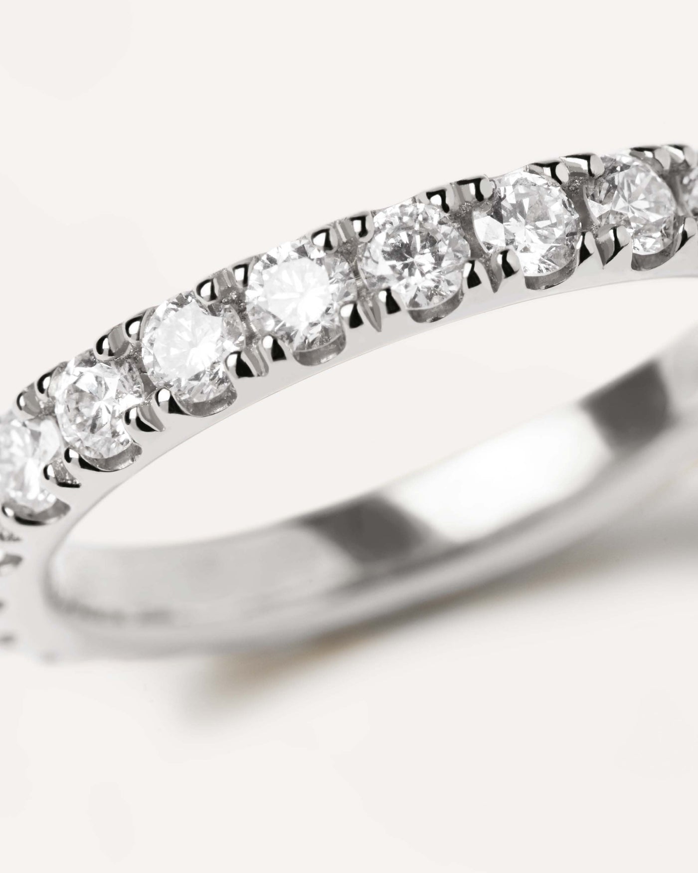 2023 Selection | Diamonds and White Gold Eternity Supreme Ring. 18K white gold eternity ring, set with big lab-grown diamonds, equaling 1.55 carats. Get the latest arrival from PDPAOLA. Place your order safely and get this Best Seller. Free Shipping.