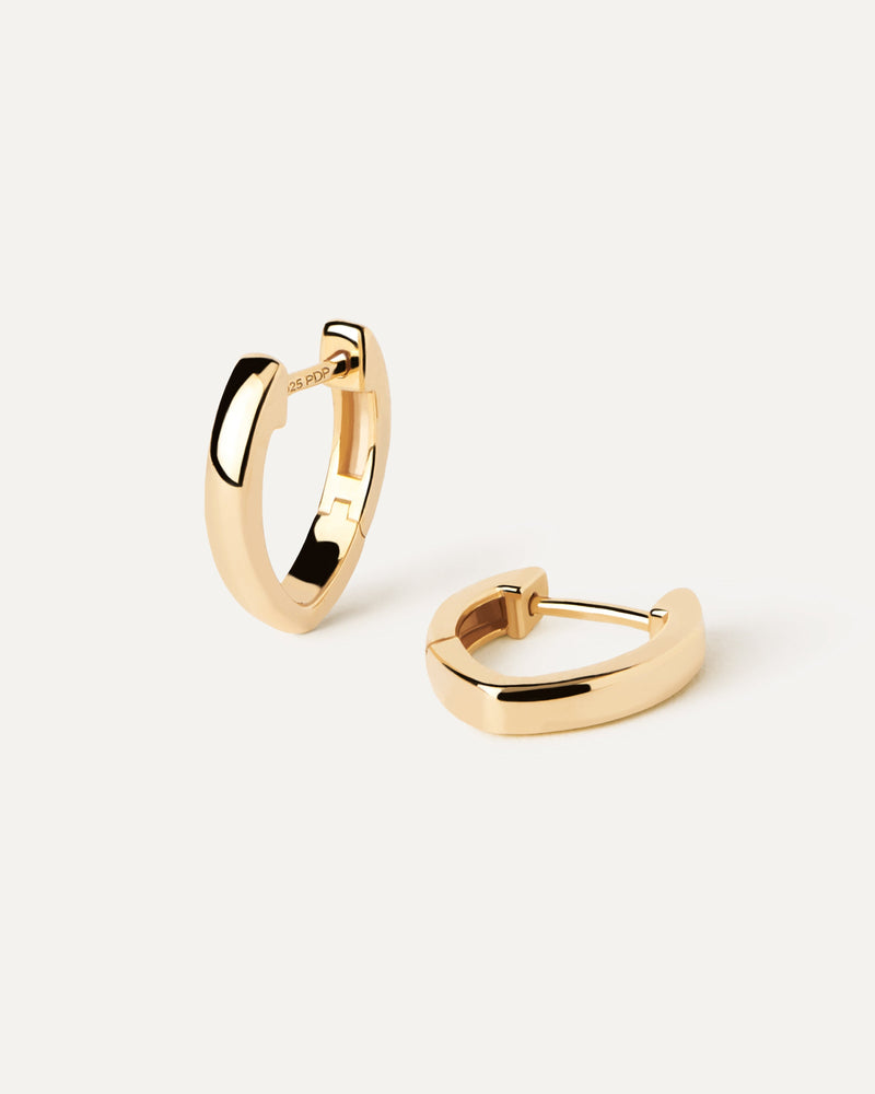 Gold-plated oval shape huggies with a hinged opening