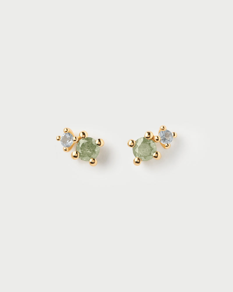 Pendientes asimétricos redondos adornados con circonitas verde hielo y azul