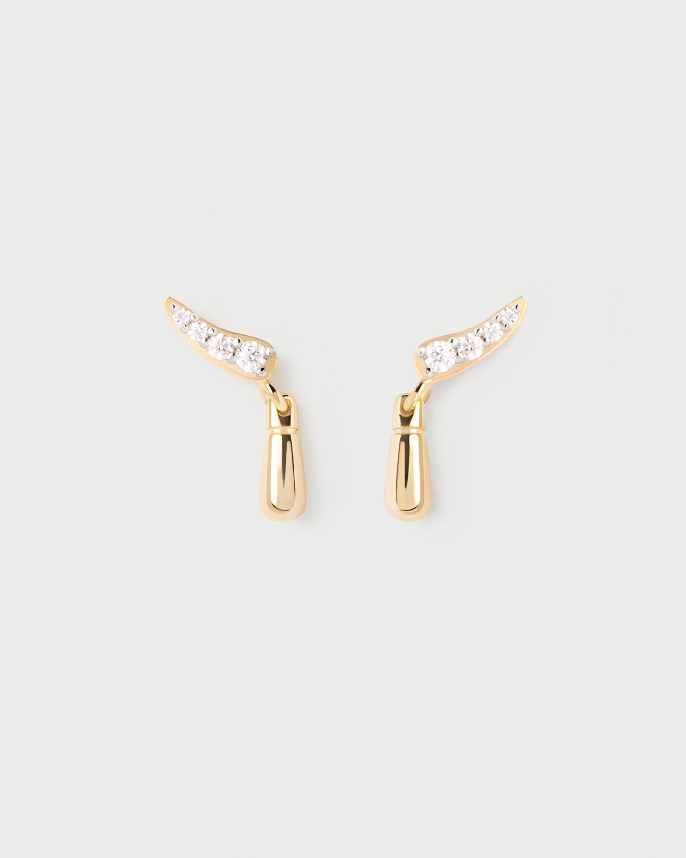 Mini stud earrings featuring pointed curve pave zirconia and a drop. Kira stud earrings PDPAOLA