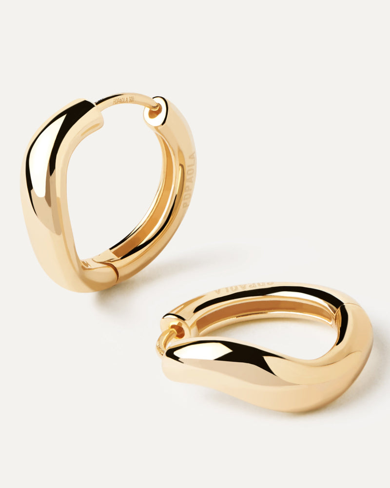 Wavy plain band hoop earrings in solid yellow gold