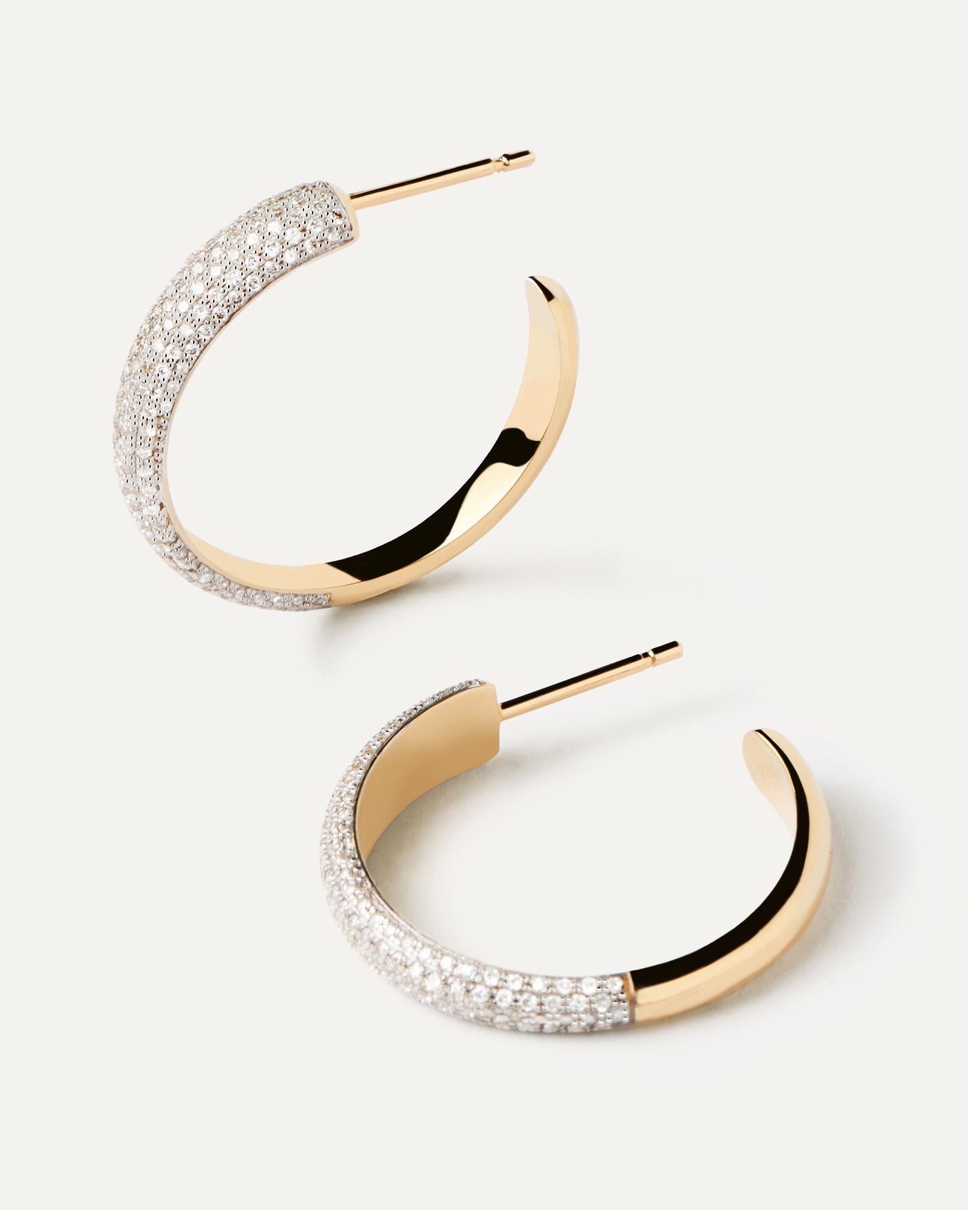 2023 Selection | Diamonds and Gold Soho Hoops. Open hoop earrings in solid yellow gold with contrasting 170 pavé diamonds of 0.51 carats. Get the latest arrival from PDPAOLA. Place your order safely and get this Best Seller. Free Shipping.