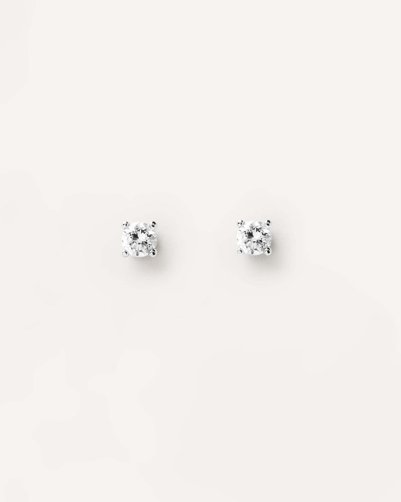 Puces d'oreilles en or blanc massif avec diamants solitaires de 0,10 carat chacun