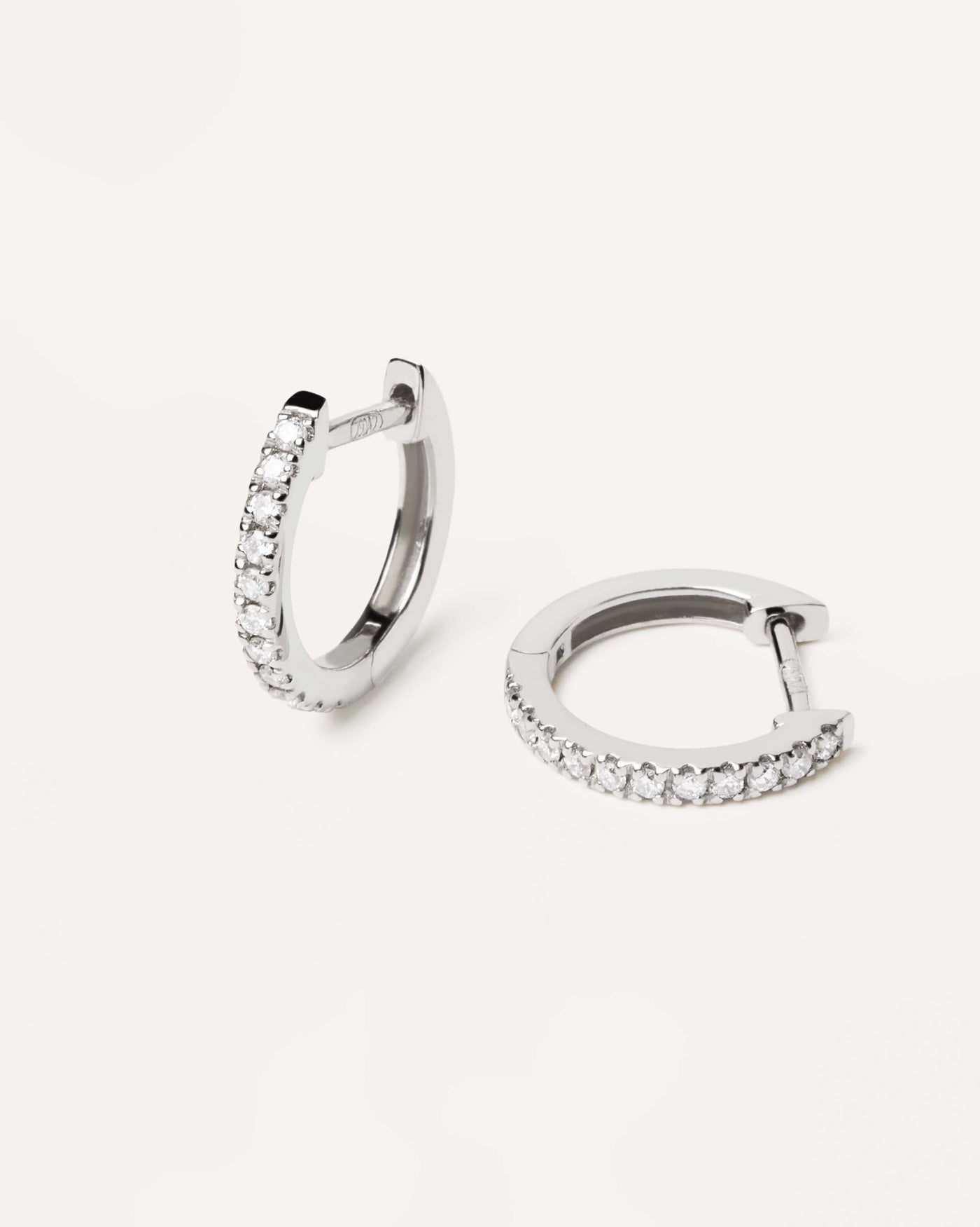 2024 Selection | Diamonds and White Gold Eternity Mini Hoops. Small 18K white gold hoop earrings, set with lab-grown diamonds of 0.18 carats in total. Get the latest arrival from PDPAOLA. Place your order safely and get this Best Seller. Free Shipping.