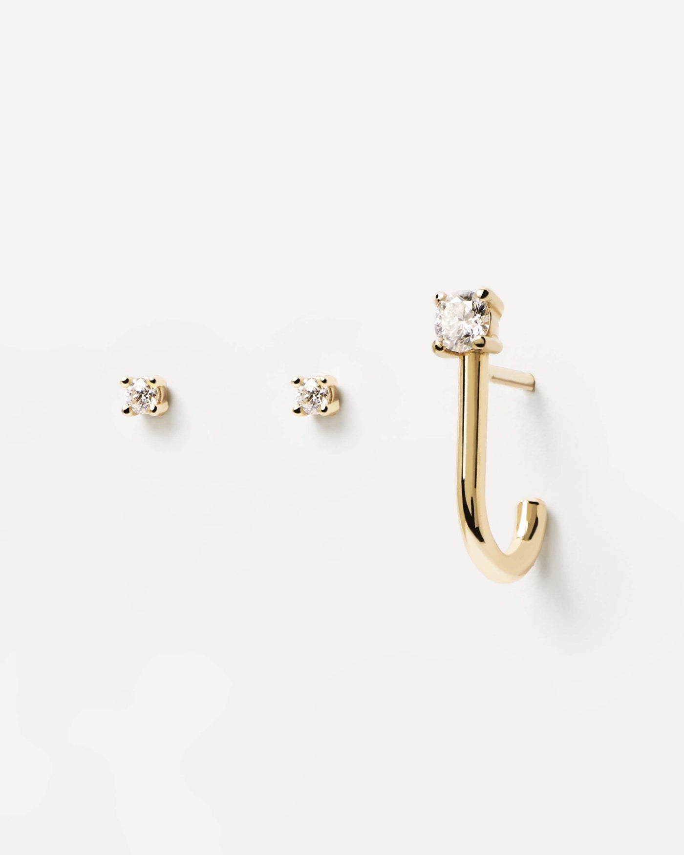 2023 Selection | Diamonds and Gold Solitaire Earrings Set. Solid yellow gold earring set with 3 individual diamond solitaire studs, making 0.16 carats. Get the latest arrival from PDPAOLA. Place your order safely and get this Best Seller. Free Shipping.