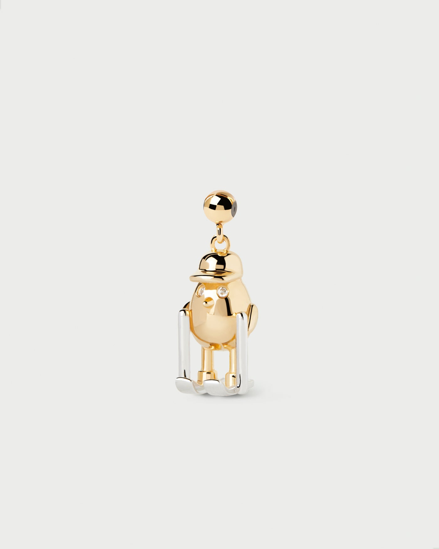 Skiier Charm 
  
    Sterling Silver / 18K Gold plating
  
