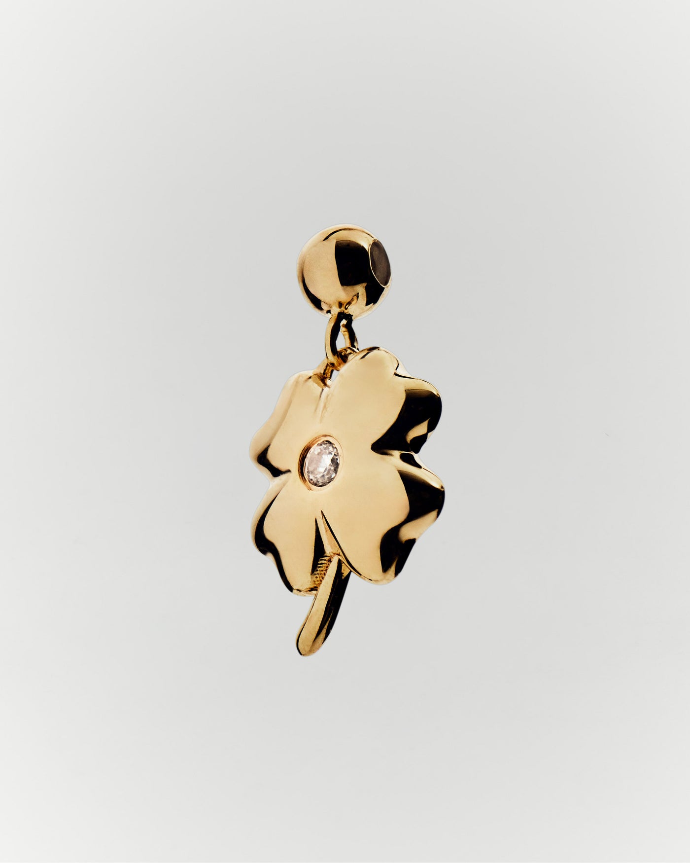 Four leaf clover charm set with white zirconia to personalize necklace or bracelet