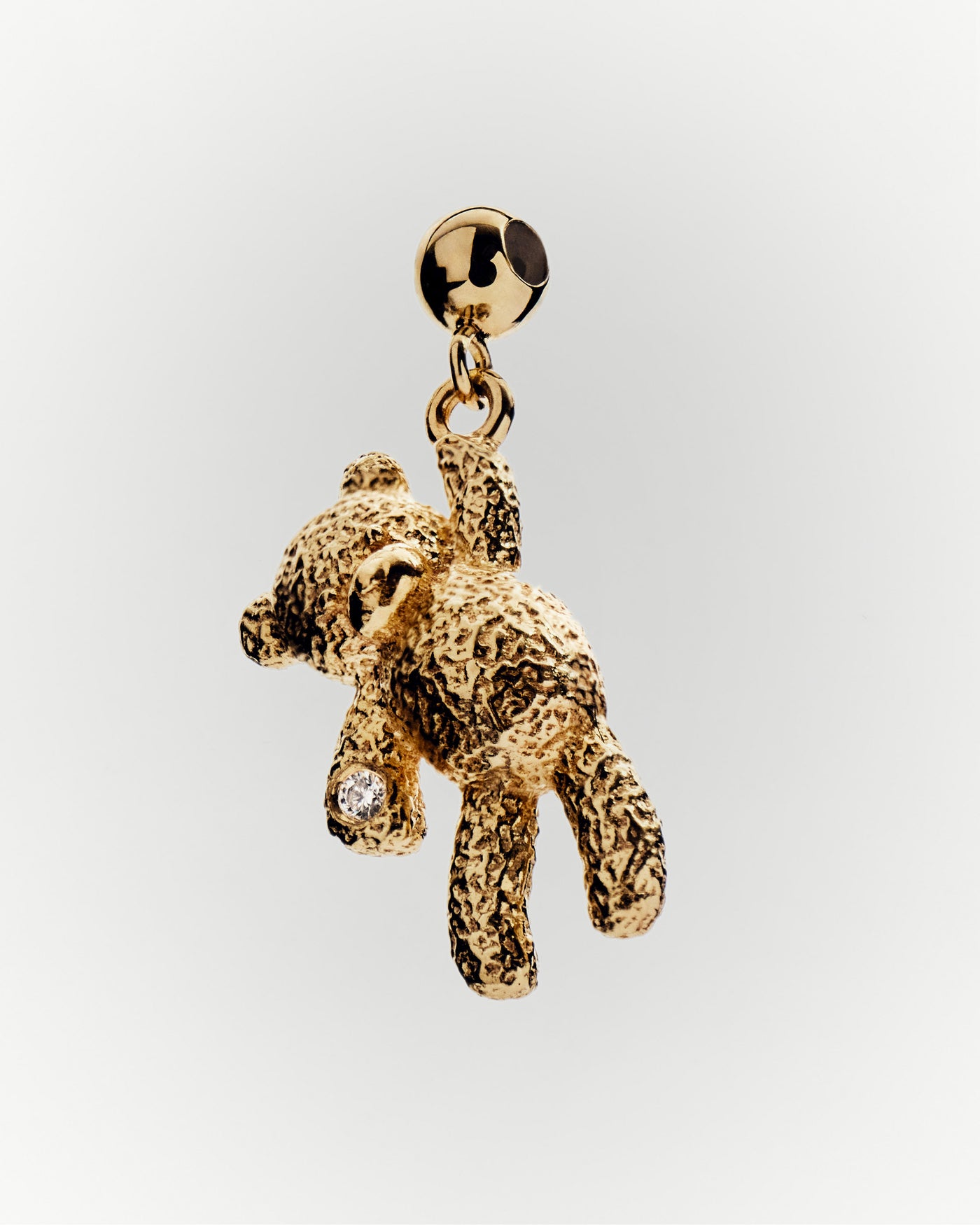 Teddy bear charm 
  
    Sterling Silver / 18K Gold plating
  
