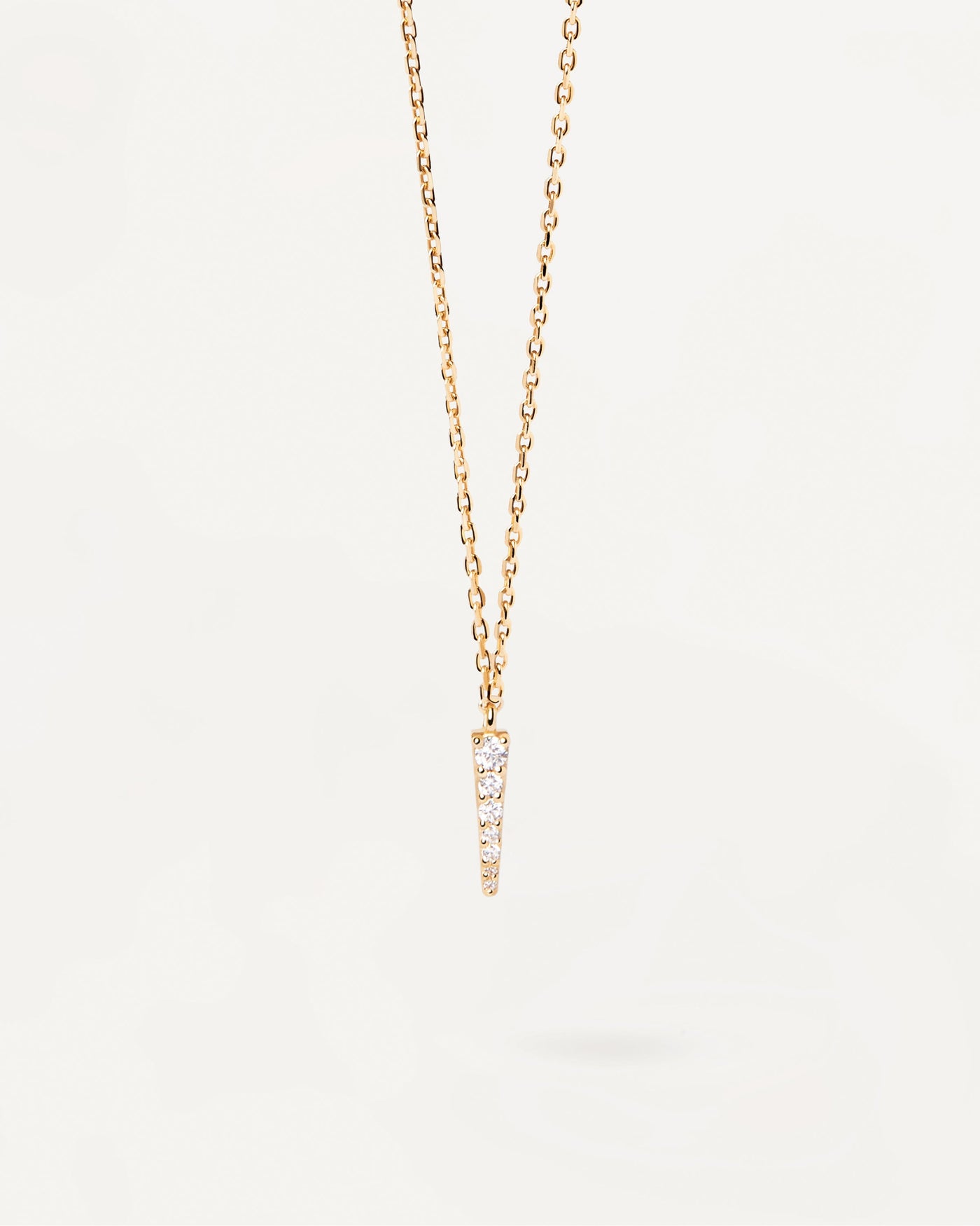 2023 Selection | Peak Necklace. Gold-plated silver necklace with white zirconia pendant in tip shape. Get the latest arrival from PDPAOLA. Place your order safely and get this Best Seller. Free Shipping.
