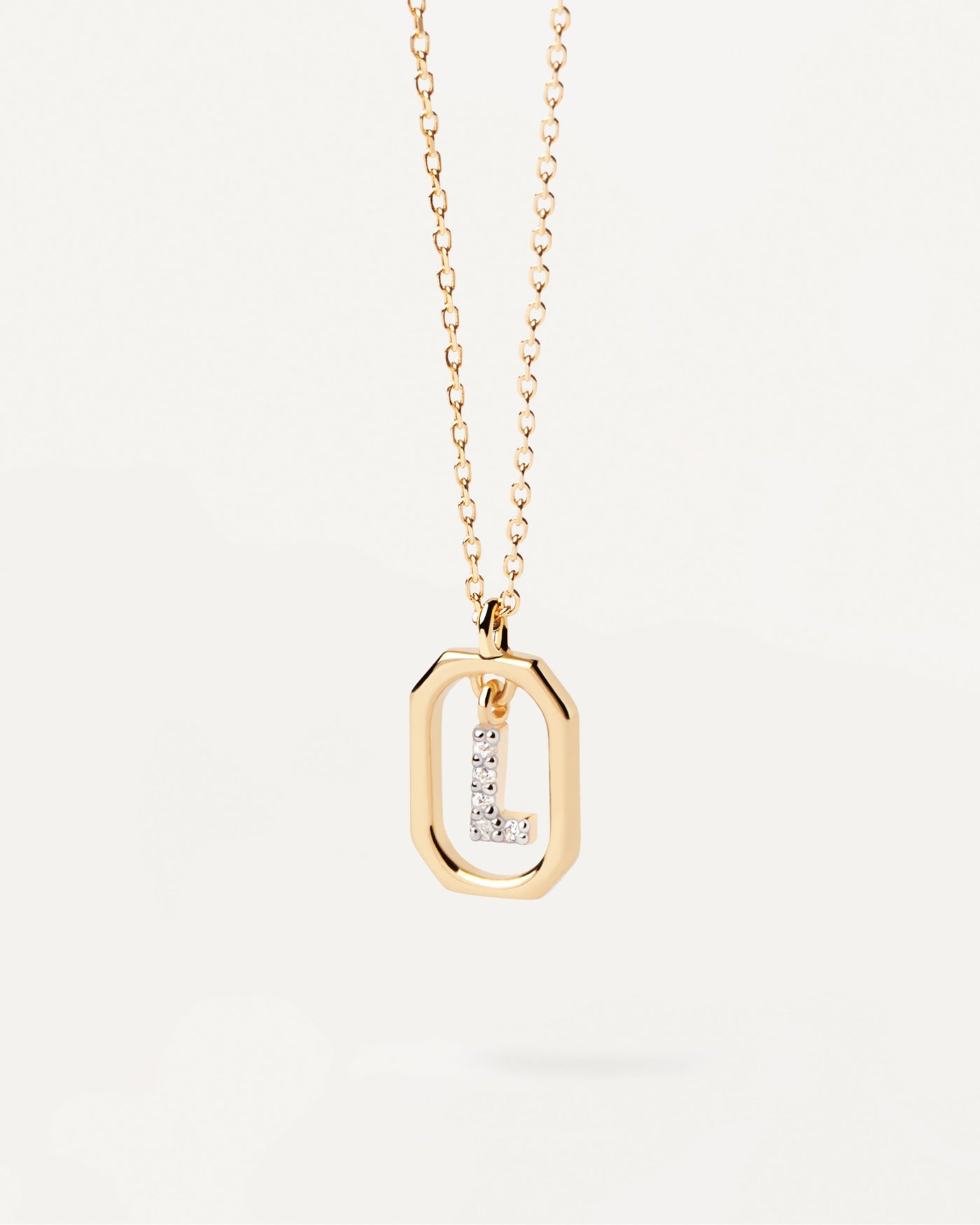 2023 Selection | Mini Letter L Necklace. Small initial L necklace in zirconia inside gold-plated silver octagonal pendant. Get the latest arrival from PDPAOLA. Place your order safely and get this Best Seller. Free Shipping.