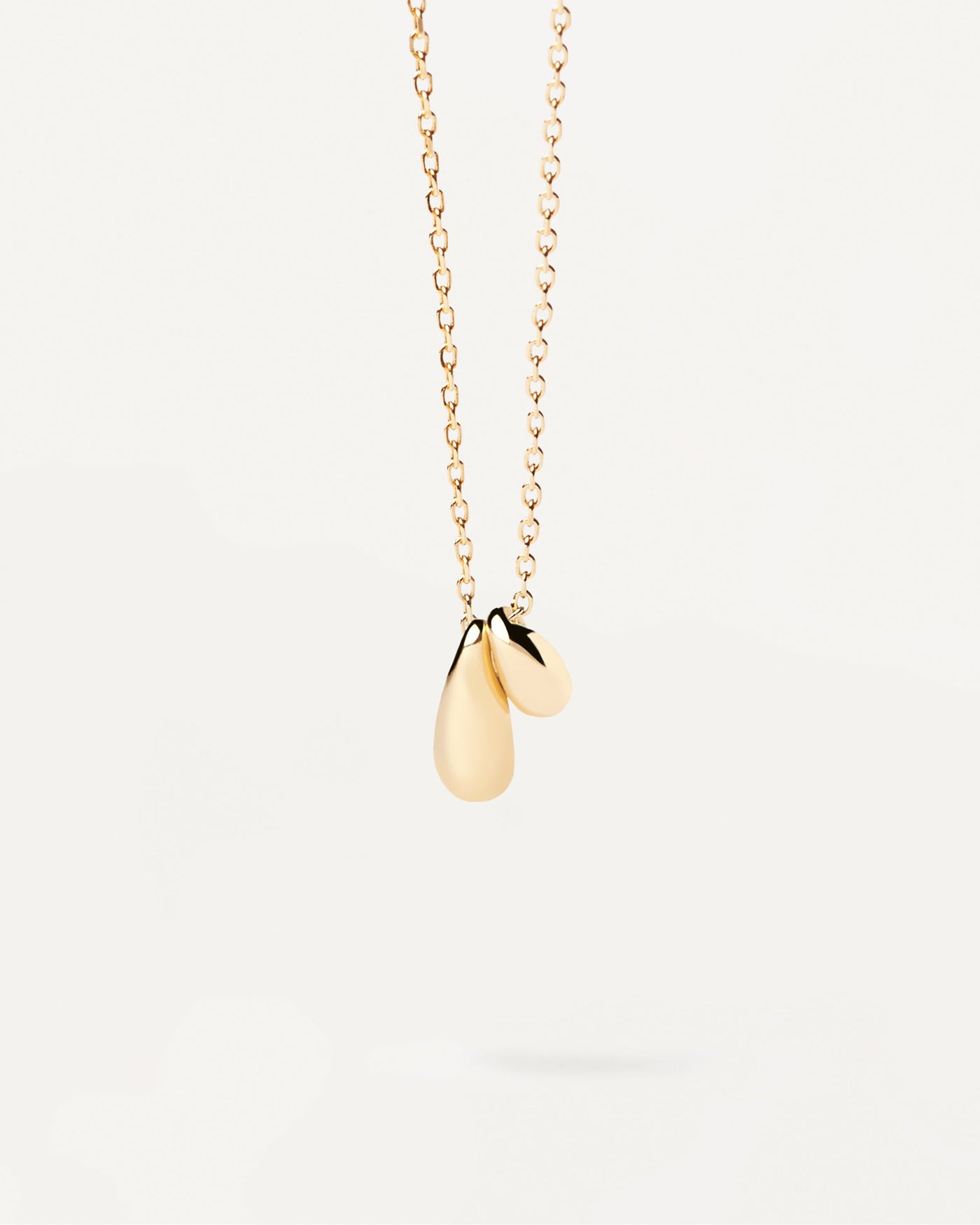 2023 Selection | Sugar Necklace. Gold-plated silver necklace with two drop pendants. Get the latest arrival from PDPAOLA. Place your order safely and get this Best Seller. Free Shipping.