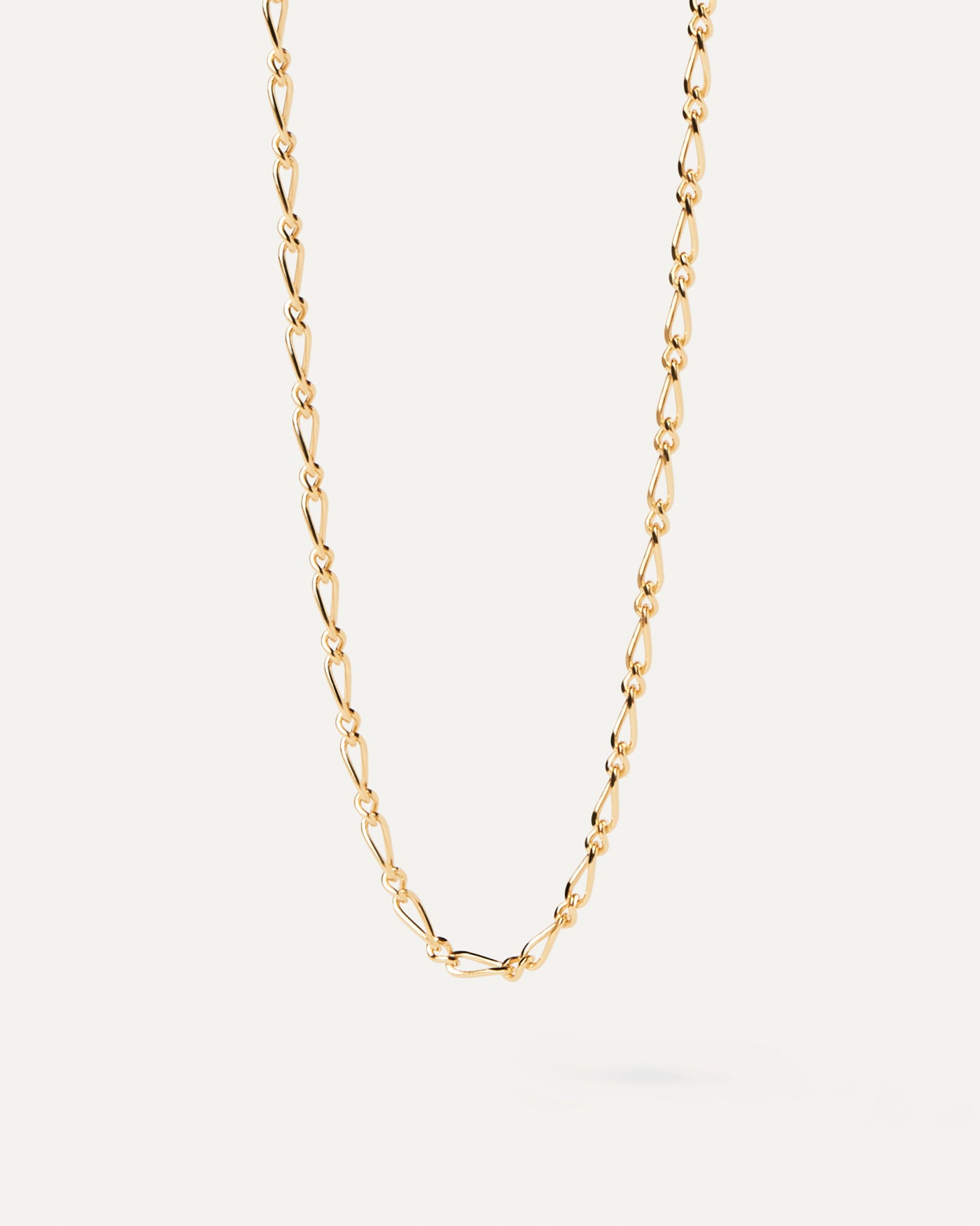 2023 Selection | Adele Chain Necklace. Gold-plated sleek chain necklace with intertwined asymmetric links. Get the latest arrival from PDPAOLA. Place your order safely and get this Best Seller. Free Shipping.