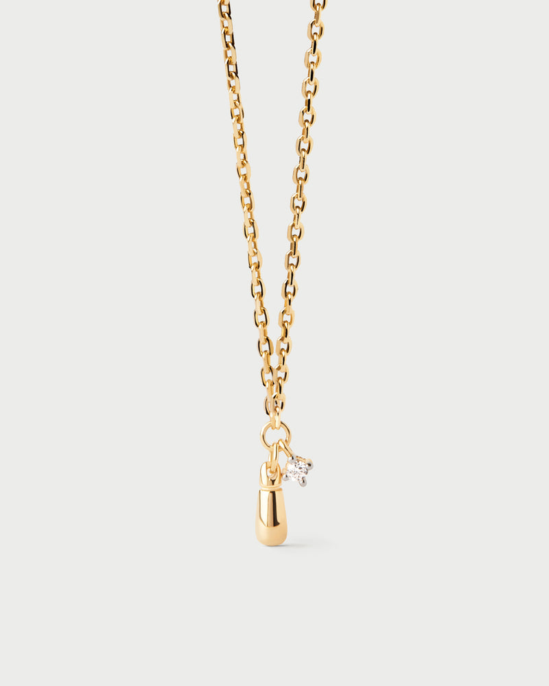 Collana a catena sottile con zirconi rotondi e ciondolo a goccia