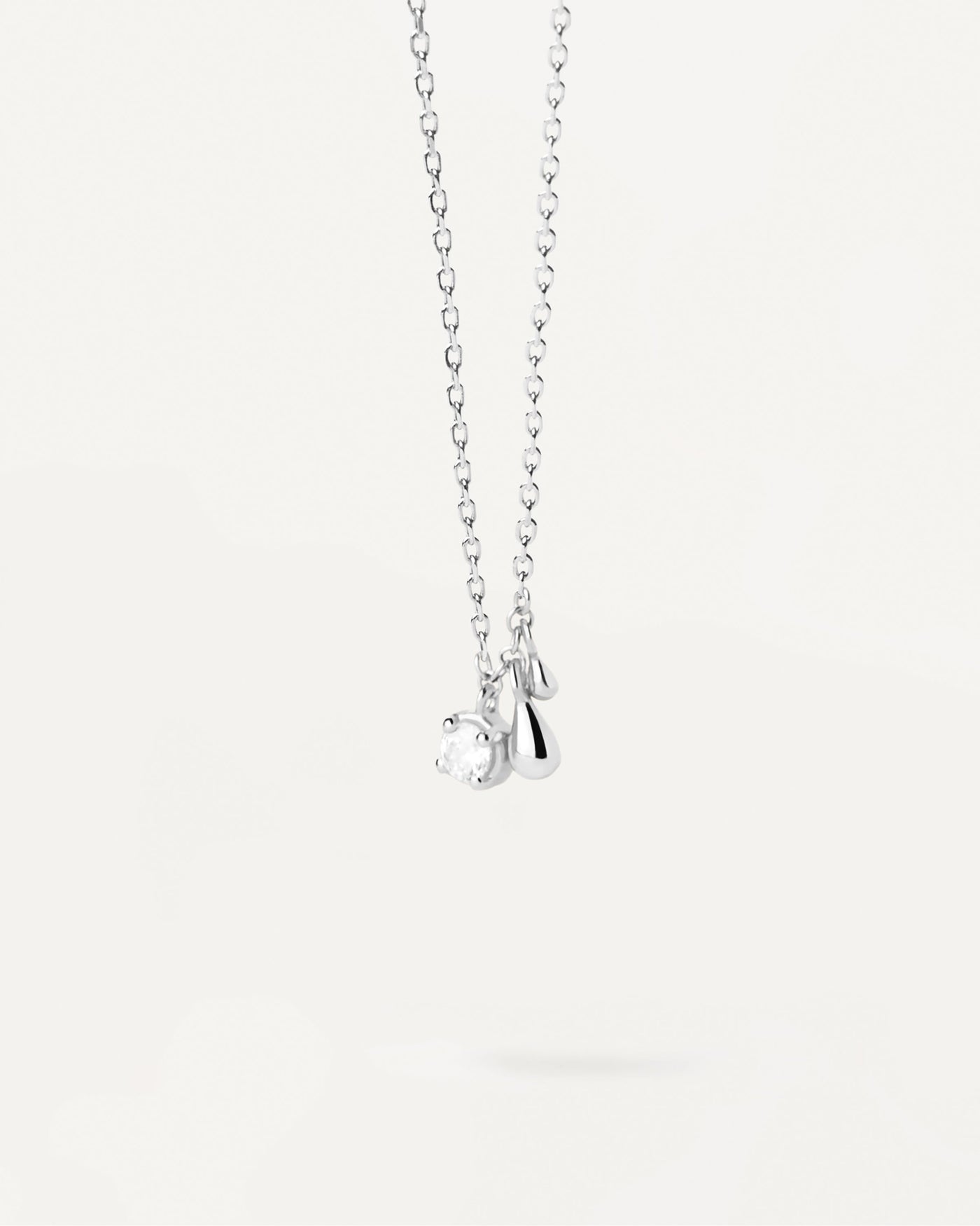 2023 Selection | Water Silver Necklace. Sterling silver necklace with white zirconia and two small drop pendants. Get the latest arrival from PDPAOLA. Place your order safely and get this Best Seller. Free Shipping.