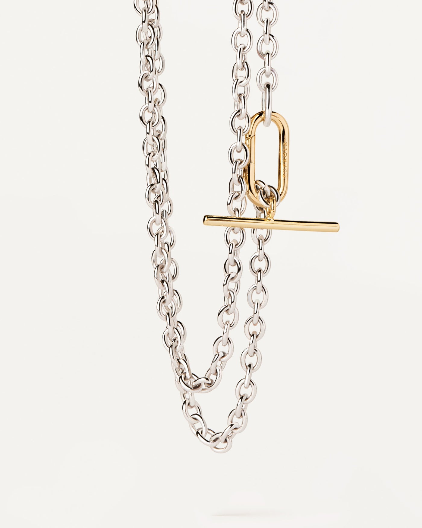 2023 Selection | Long Beat Chain Necklace. Bicolor T-bar double chain necklace with silver links and gold-plated clasp. Get the latest arrival from PDPAOLA. Place your order safely and get this Best Seller. Free Shipping.