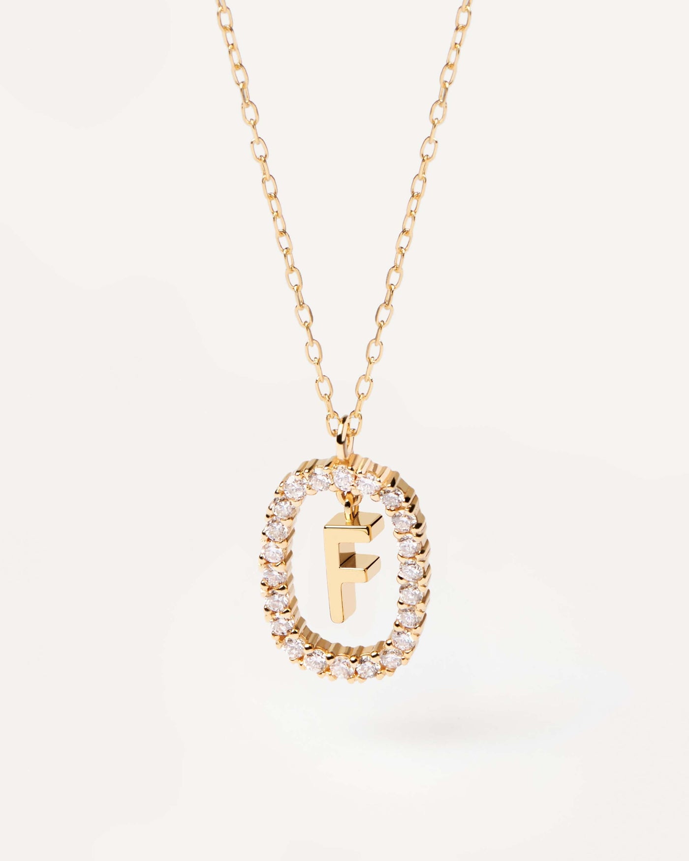 Initial F necklace in solid yellow gold, circled by 0.33 carats lab-grown diamonds