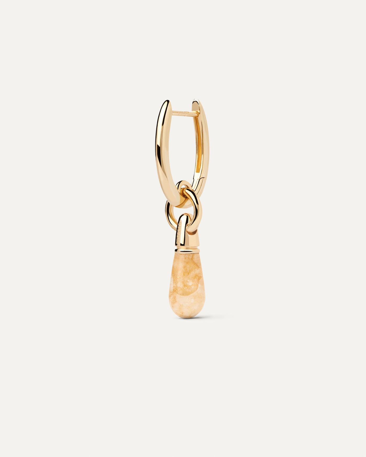 Créole Individuelle Aventurine Jaune Jupiter. Créole individuelle avec un petit pendentif de pierre jaune en forme de goutte. Découvrez les dernières nouveautés de chez PDPAOLA. Commandez et recevez votre bijou en toute sérénité.