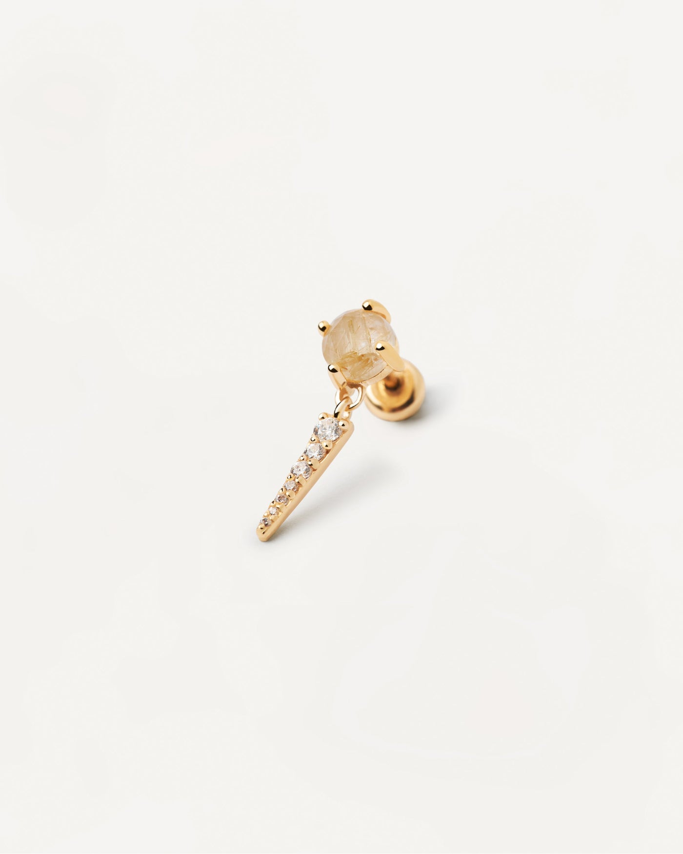 Boucle D’Oreille Individuelle Yoki Quartz Rutile. Piercing d'oreille en plaqué or avec pierre fine beige et pendentif de zircons blancs. Découvrez les dernières nouveautés de chez PDPAOLA. Commandez et recevez votre bijou en toute sérénité.