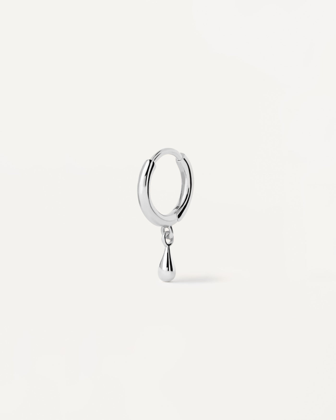 2023 Selection | Teardrop silver single hoop Earring. Sterling silver ear piercing with small drop pendant. Get the latest arrival from PDPAOLA. Place your order safely and get this Best Seller. Free Shipping.