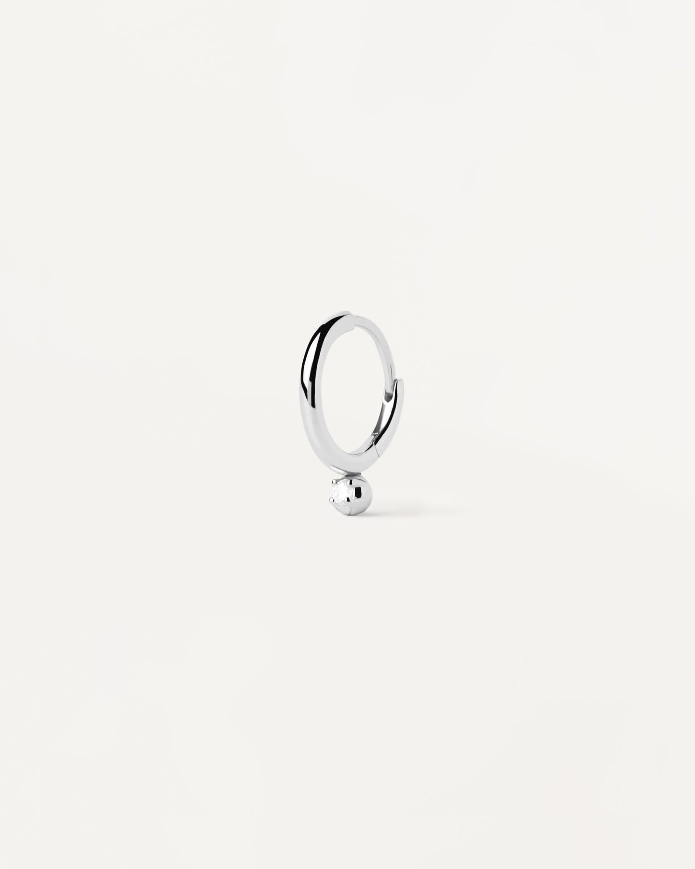 2023 Selection | Tide silver single hoop Earring. Sterling silver ear piercing with tiny white zirconia pendant. Get the latest arrival from PDPAOLA. Place your order safely and get this Best Seller. Free Shipping.