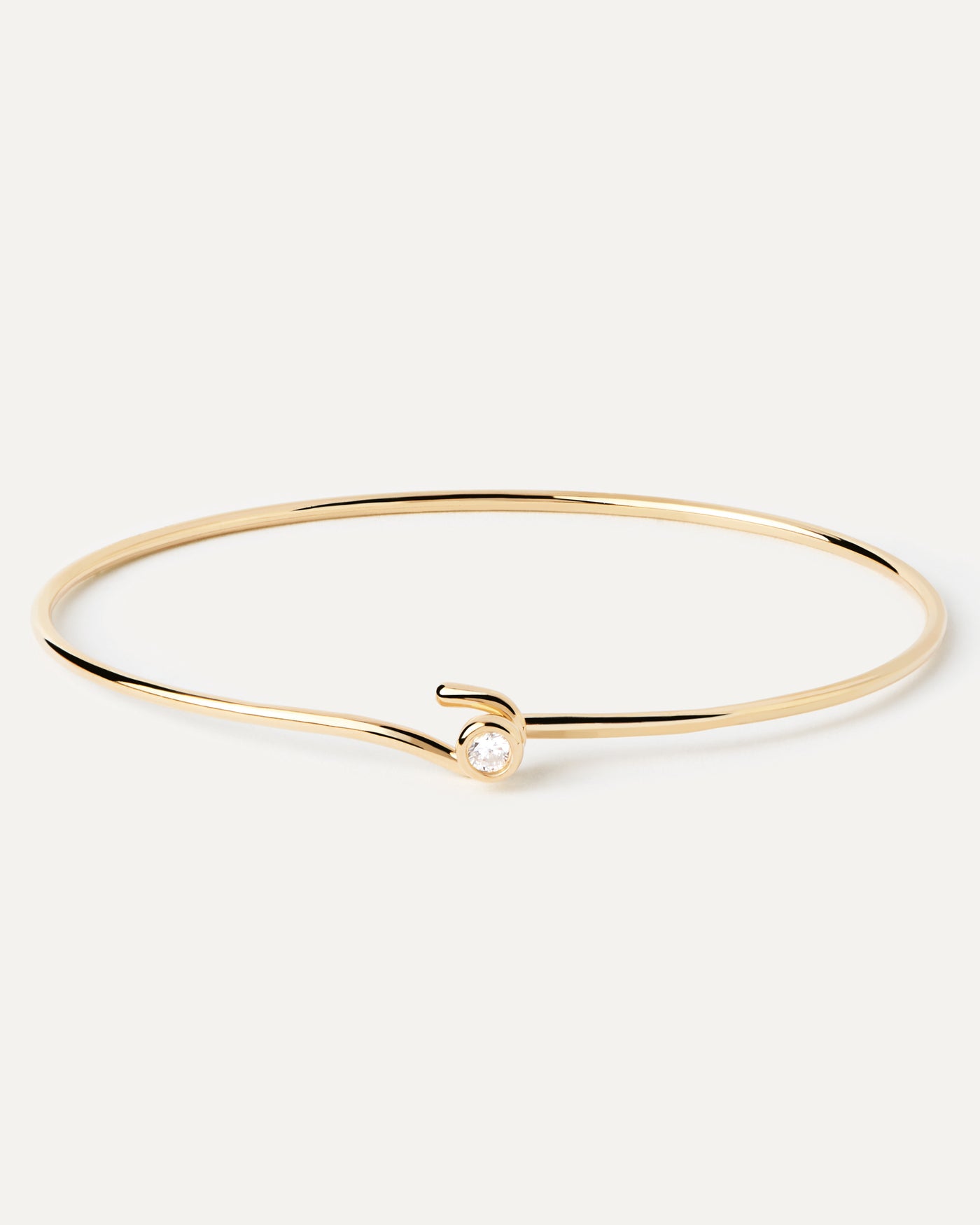 Gold-plated slim hook bangle topped with white zirconia