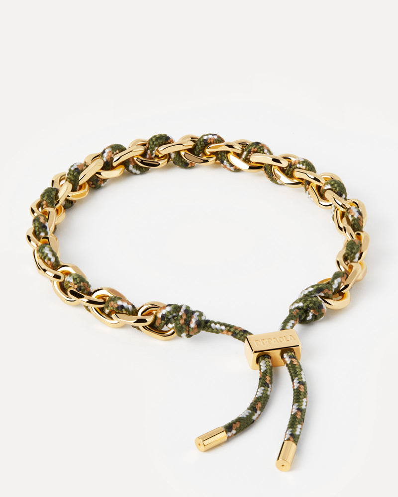 Golden chain bracelet with intertwined forest green rope and adjustable sliding clasp