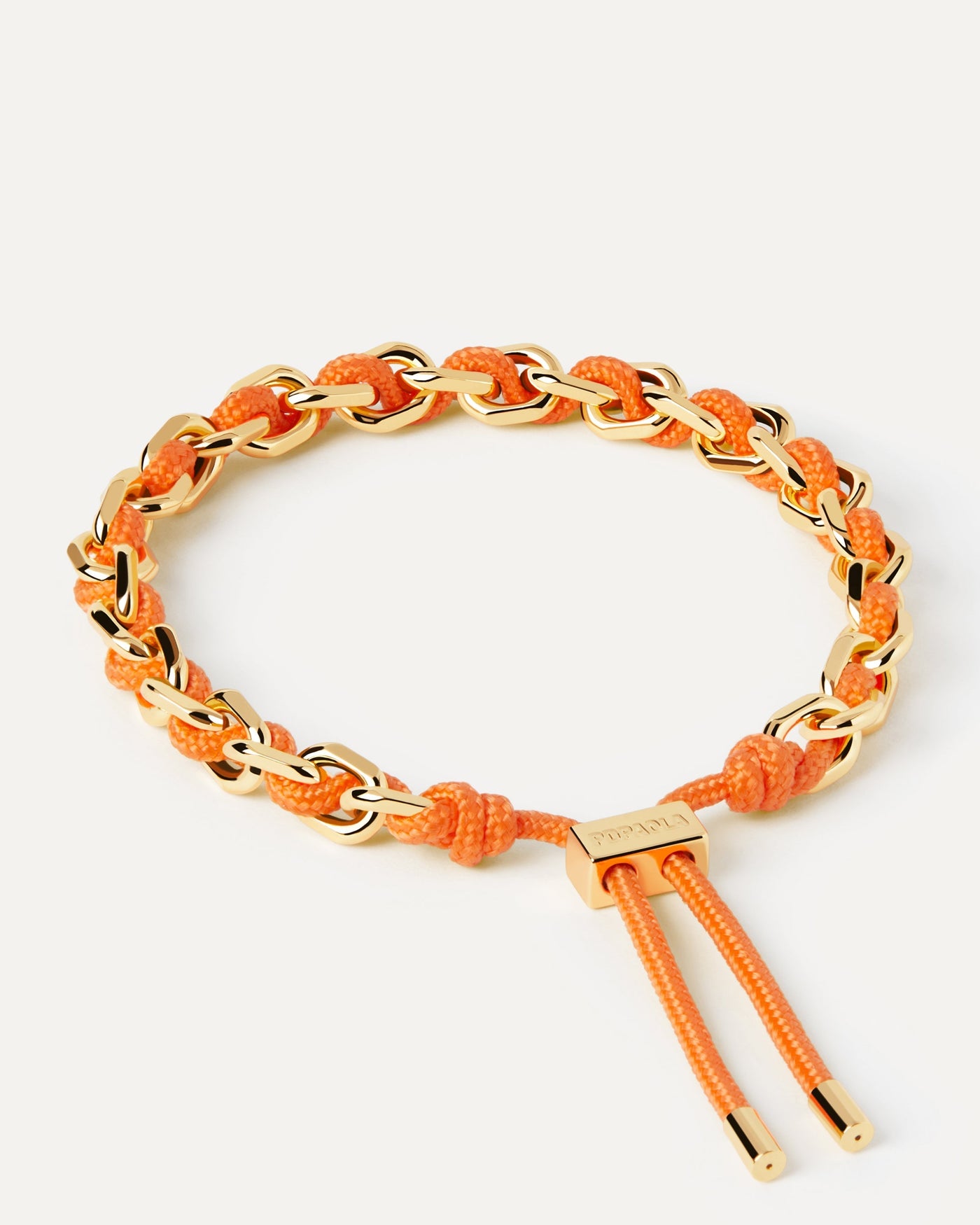 2023 Selection | Tangerine Rope and Chain Bracelet. Golden chain bracelet with an orange rope adjustable sliding clasp. Get the latest arrival from PDPAOLA. Place your order safely and get this Best Seller. Free Shipping.