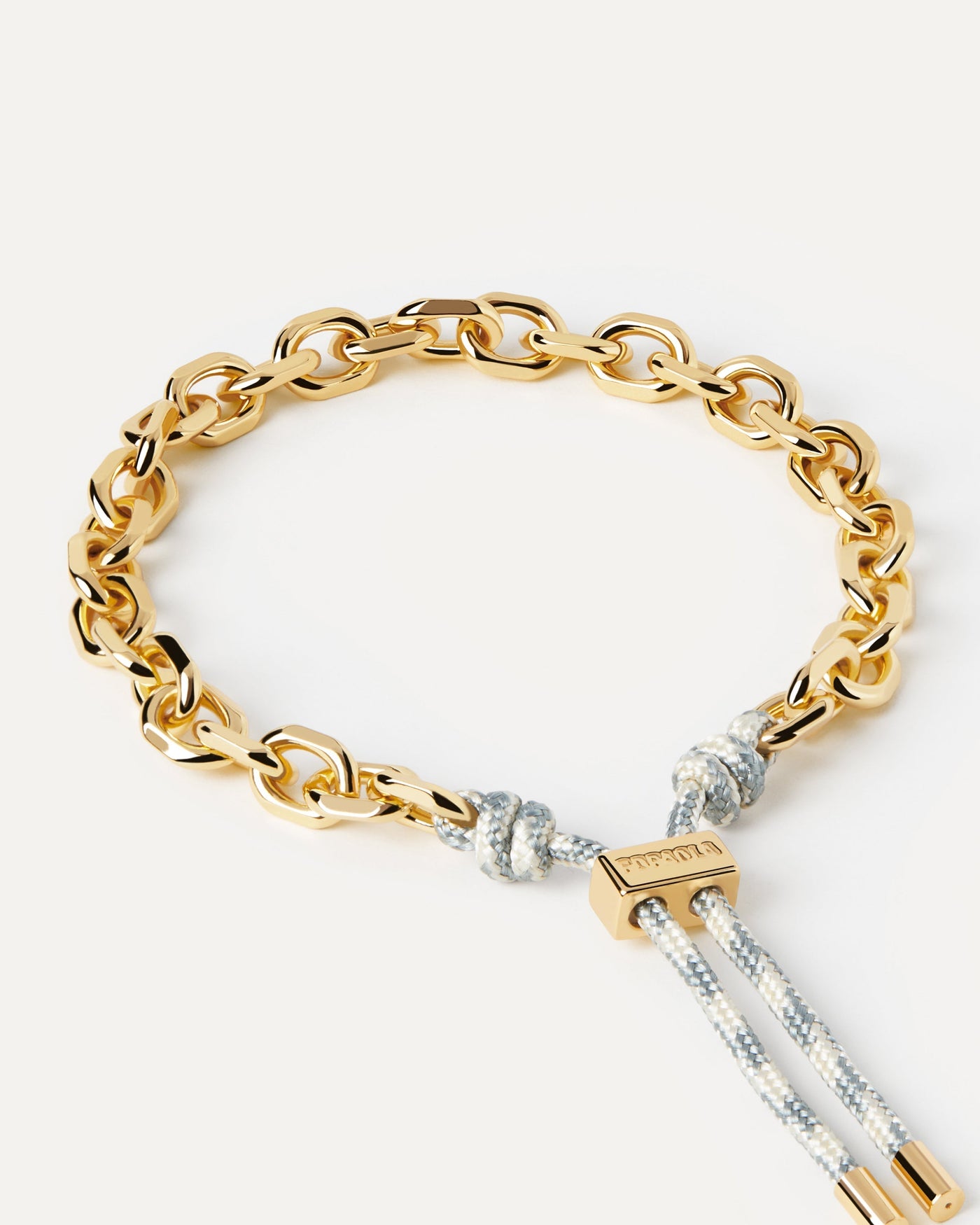 2023 Selection | Sky Essential Rope and Chain Bracelet. Silver chain bracelet with interwined blue and white rope and adjustable sliding clasp. Get the latest arrival from PDPAOLA. Place your order safely and get this Best Seller. Free Shipping.