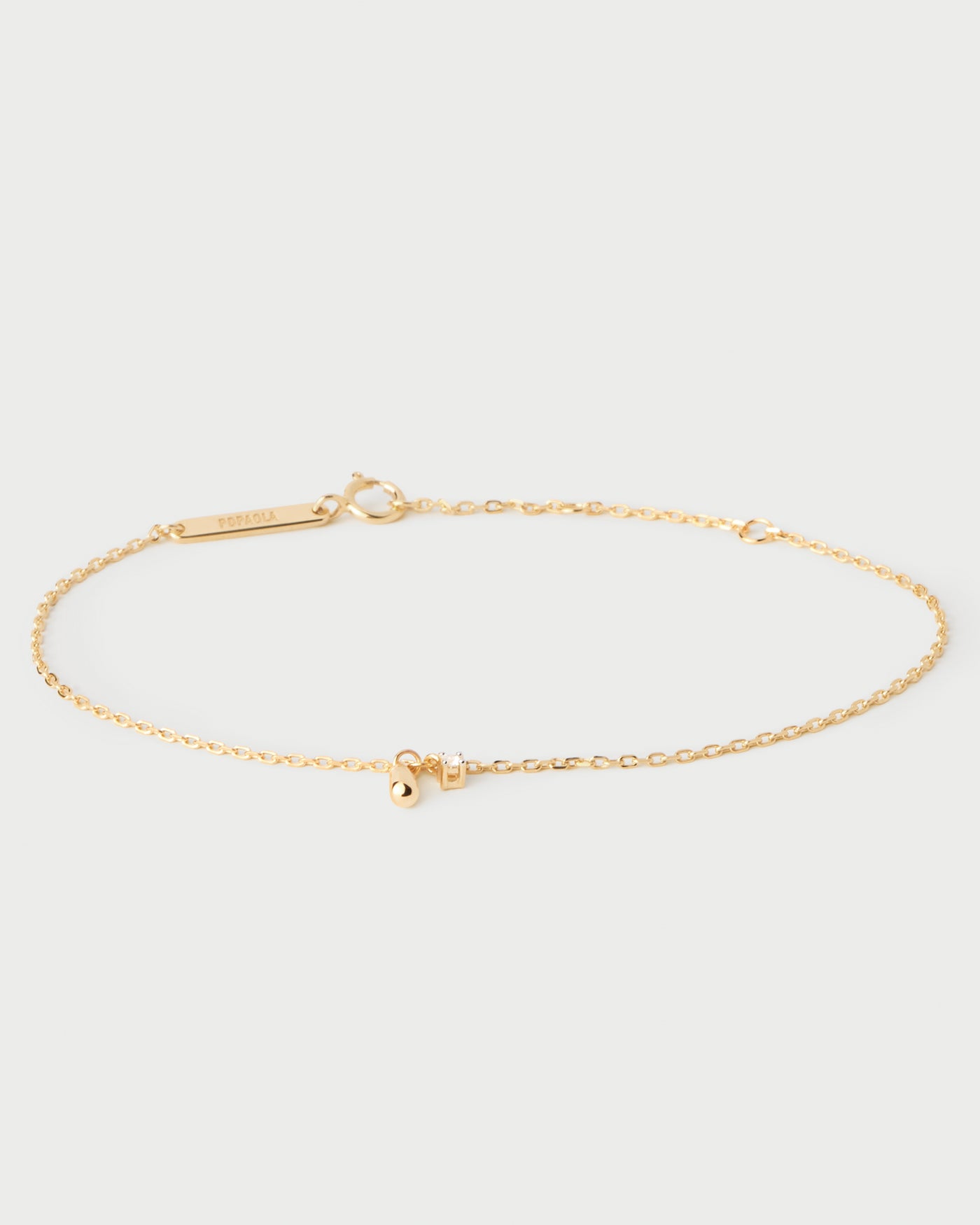 Pulsera de cadena delicada con circonita redonda y colgante en forma de gota