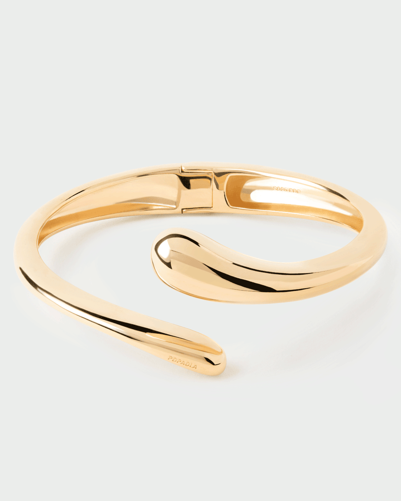 Bracciale rigido aperto con motivo scultoreo a goccia