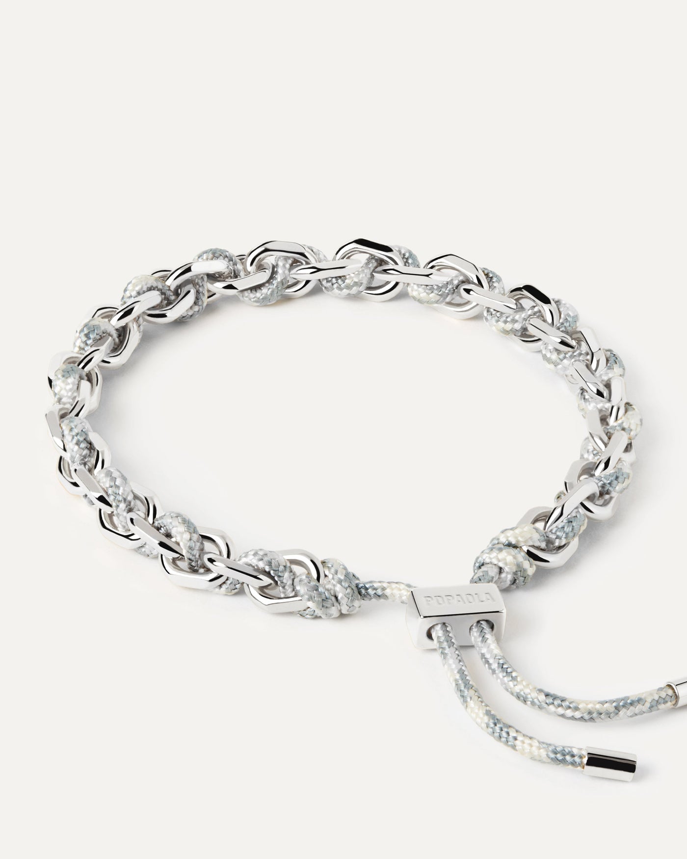 2023 Selection | Sky Rope and Chain Silver Bracelet. Silver chain bracelet with a blue and white rope adjustable sliding clasp. Get the latest arrival from PDPAOLA. Place your order safely and get this Best Seller. Free Shipping.