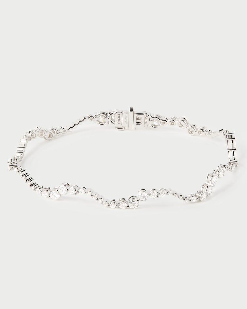 Elegante bracciale rigido con fascia ondulata impreziosita da diamanti da laboratorio